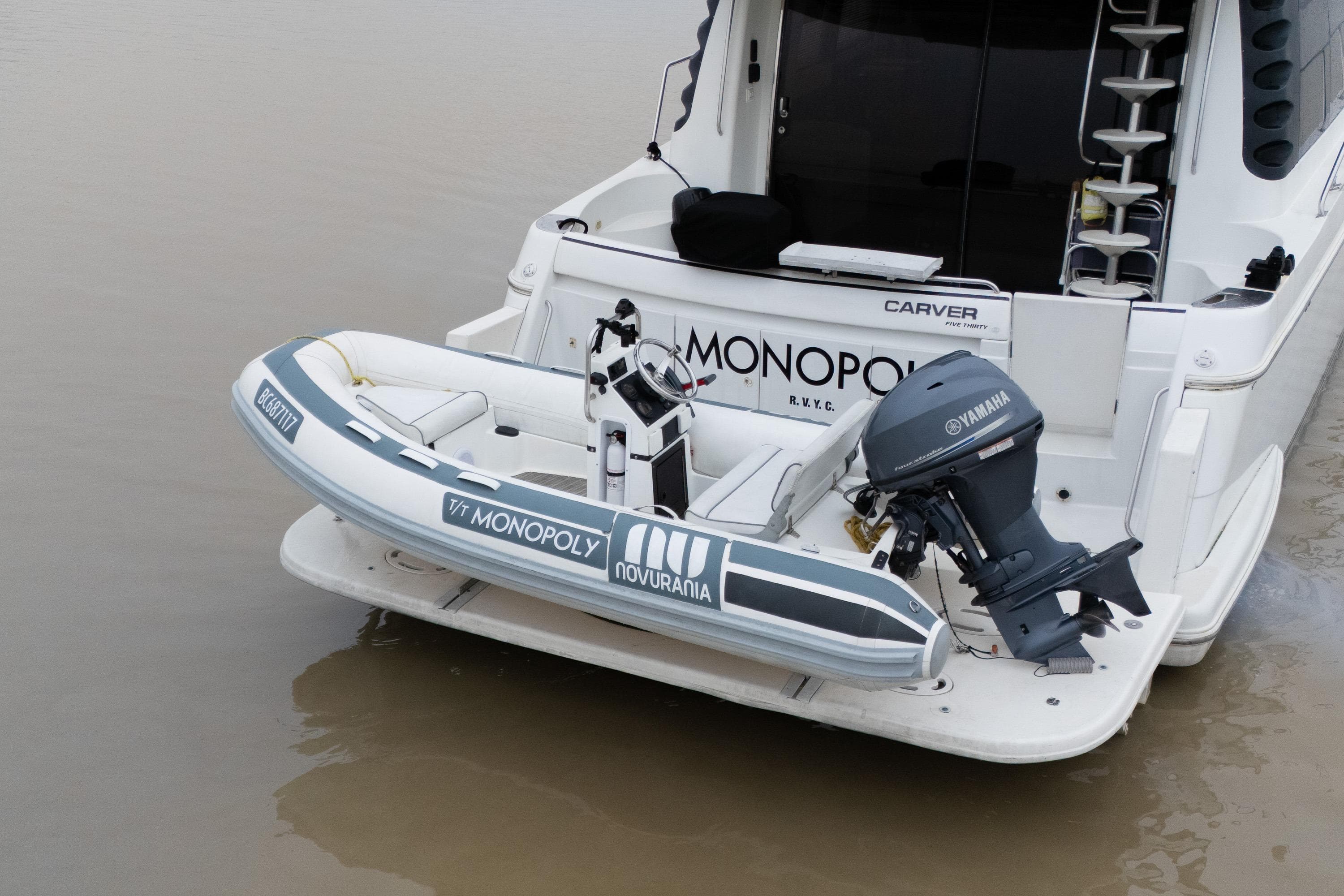 1998 Carver 530 Voyager Pilothouse with Novurania tender and Yamaha outboard motor.