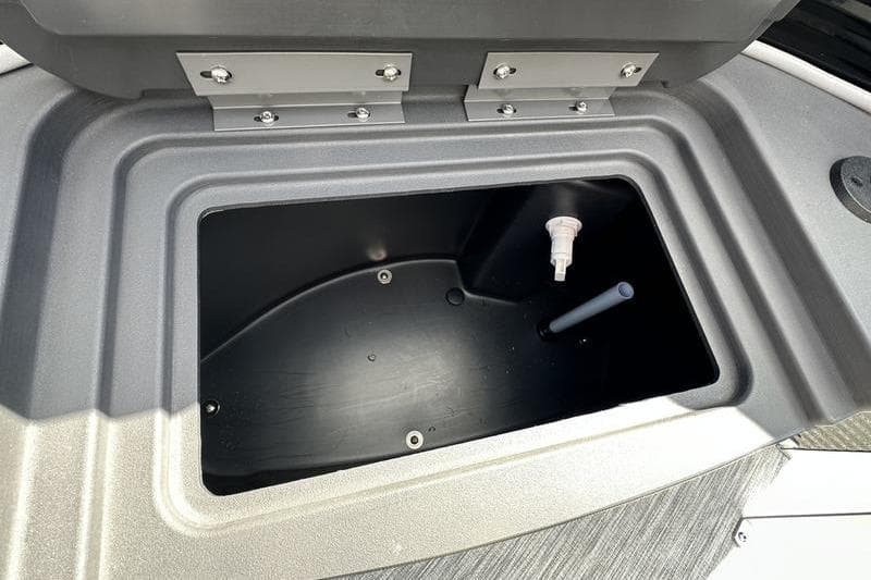 Open storage compartment on 2026 Bennington S 20 SF boat.