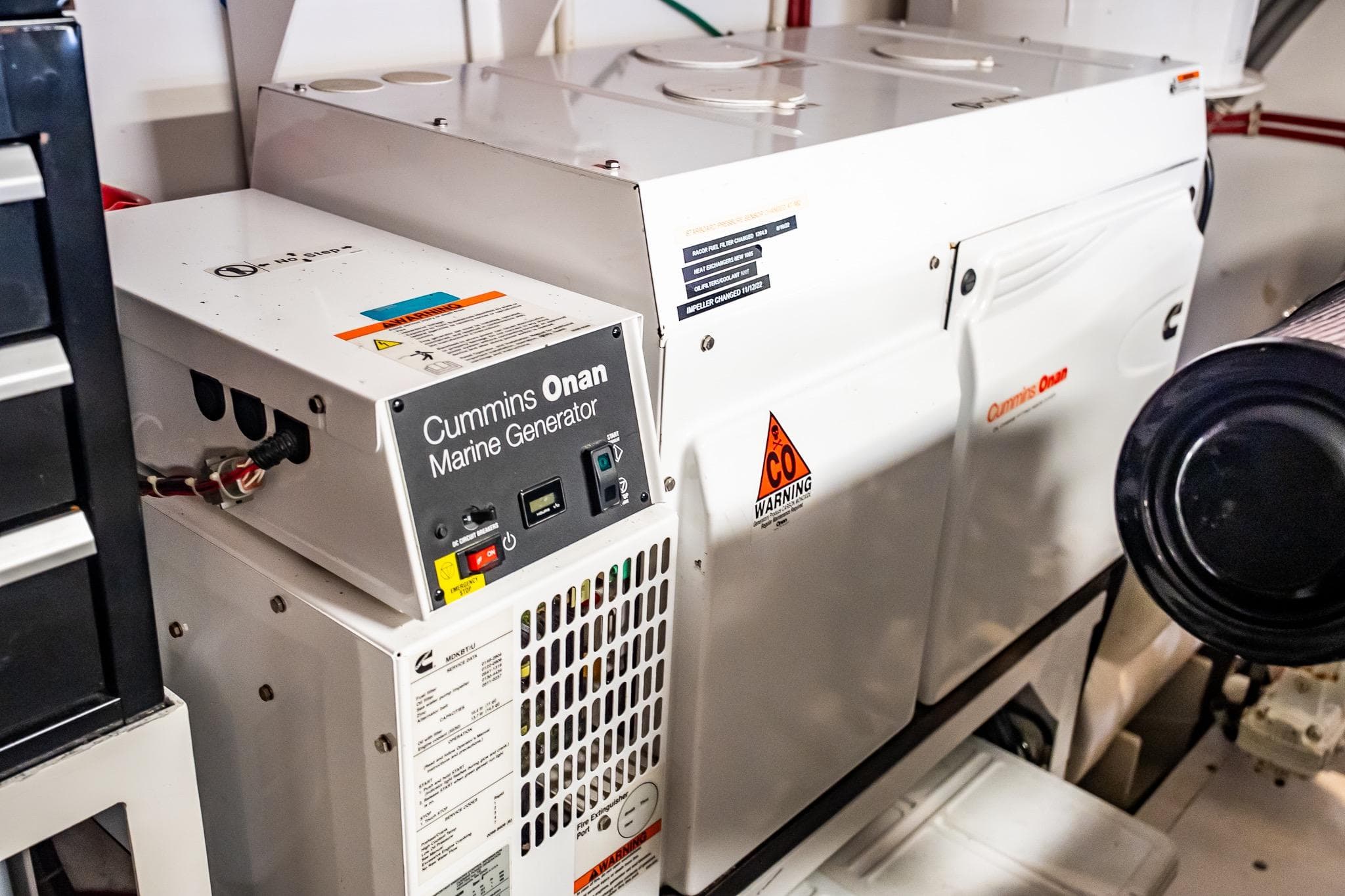 Cummins Onan marine generator in 2012 Hatteras 80 Motor Yacht engine room.
