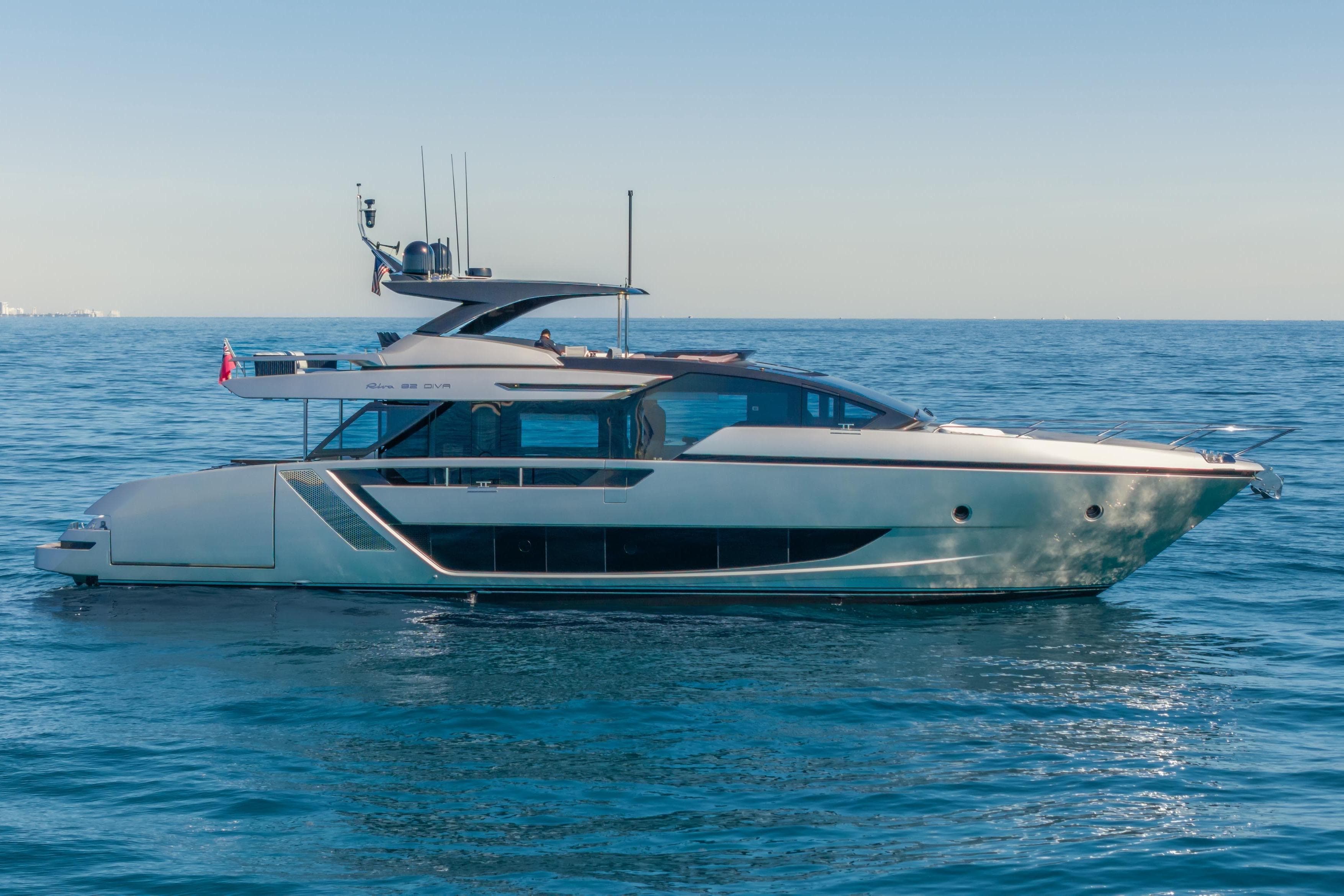 2026 Riva 82' Diva yacht cruising on calm blue ocean waters.