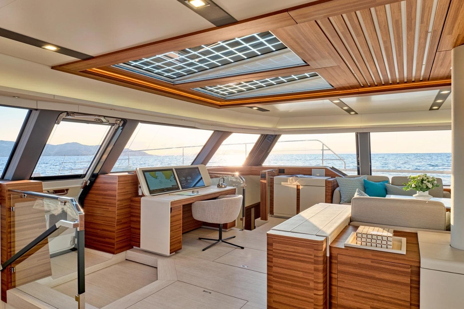 Luxurious interior of 2027 Fountaine Pajot Thira 80 yacht with modern design and ocean view.