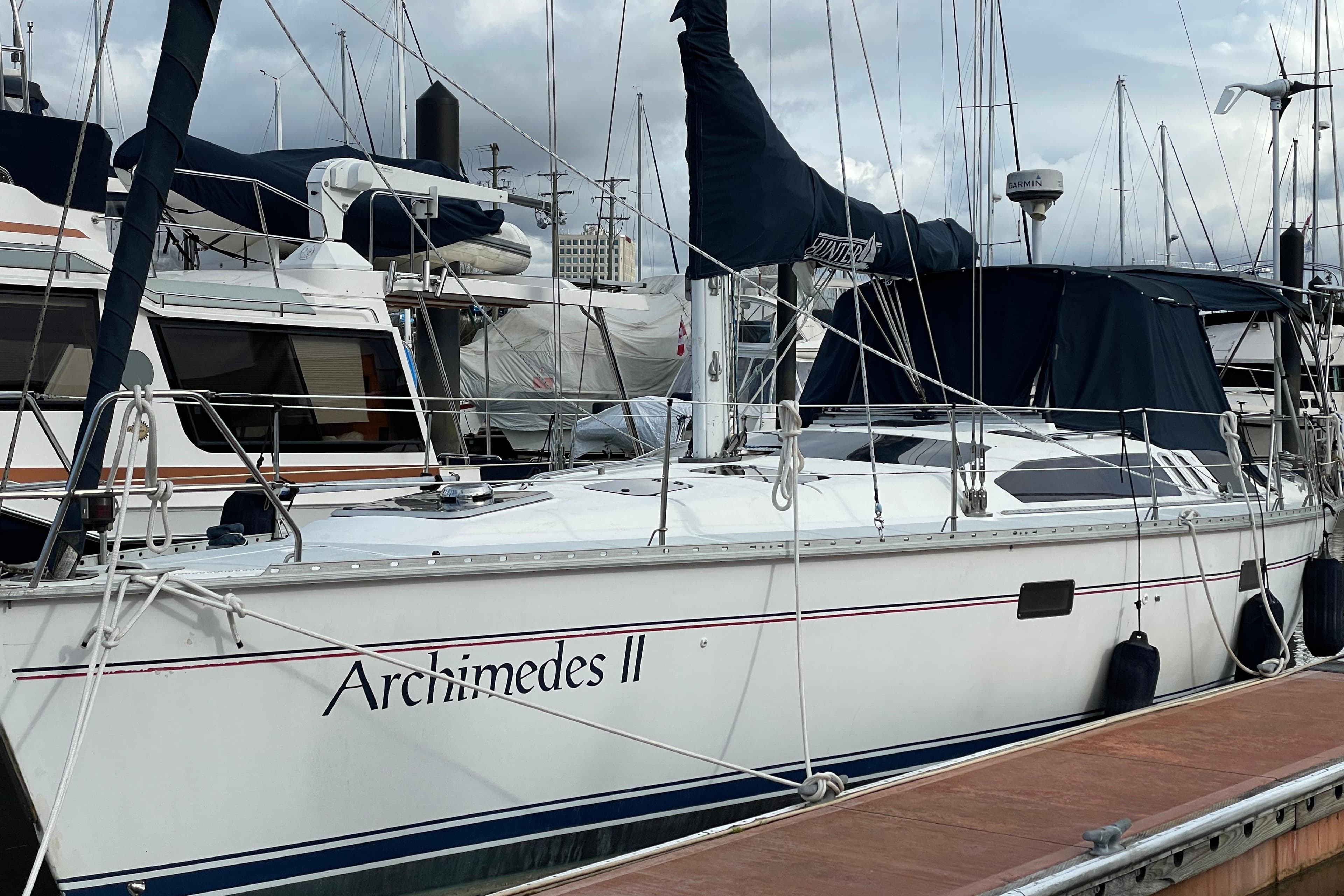 1995 Hunter Legend 40.5 sailboat "Archimedes II" docked at marina.