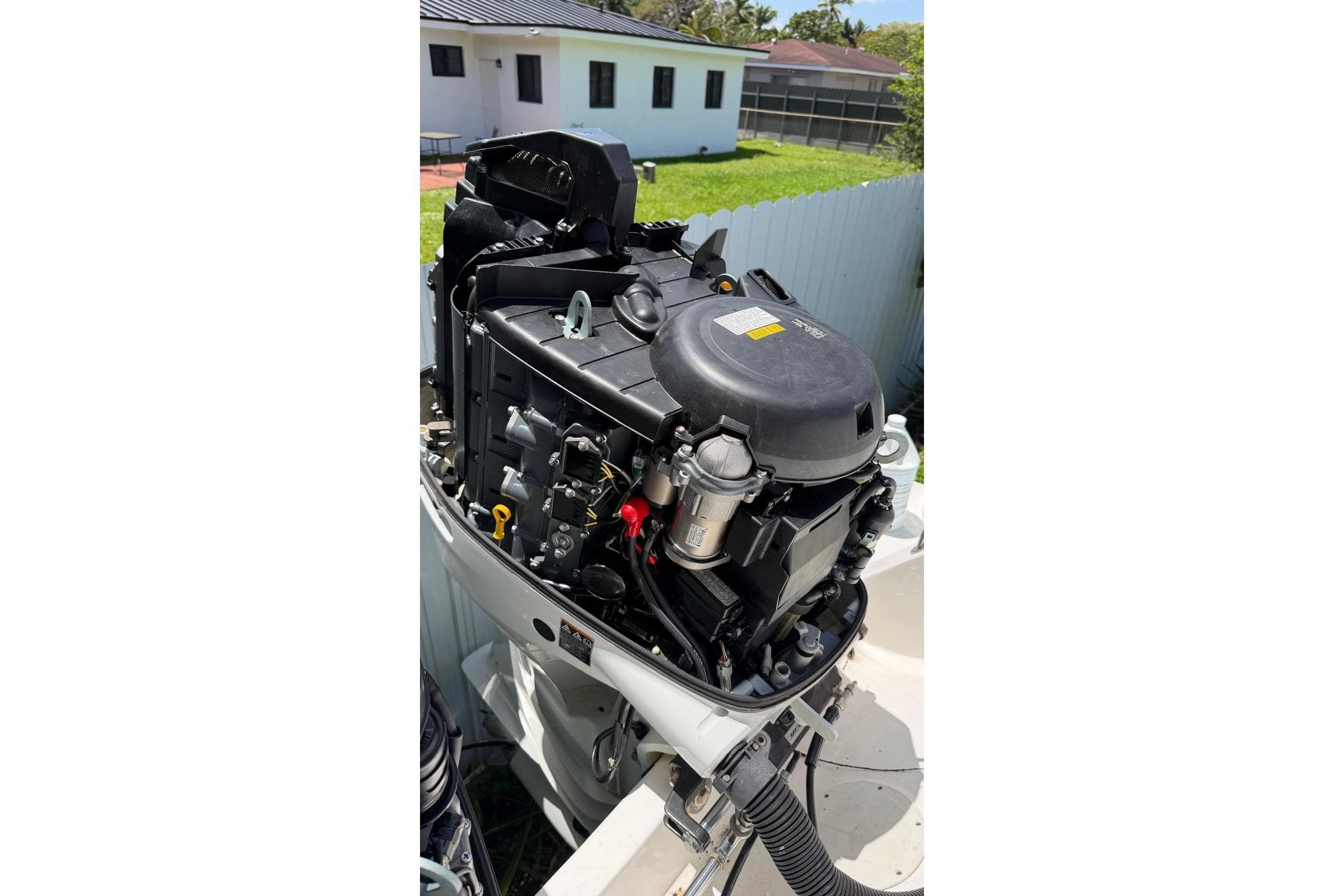 Outboard motor of a 2006 Intrepid 348 Walkaround boat, detailed view.
