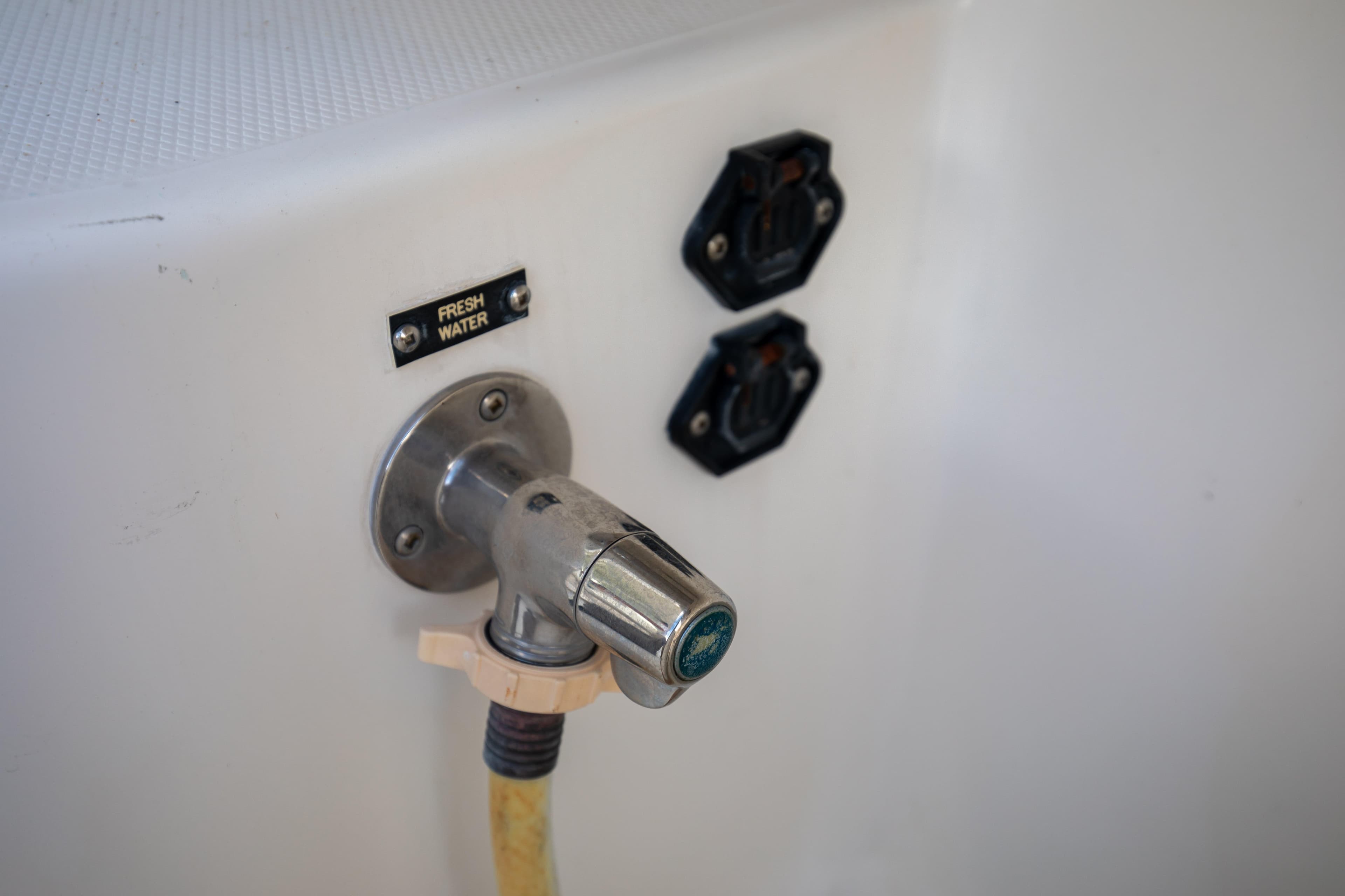 Freshwater outlet on 2015 Albemarle 360 Express Fisherman boat.