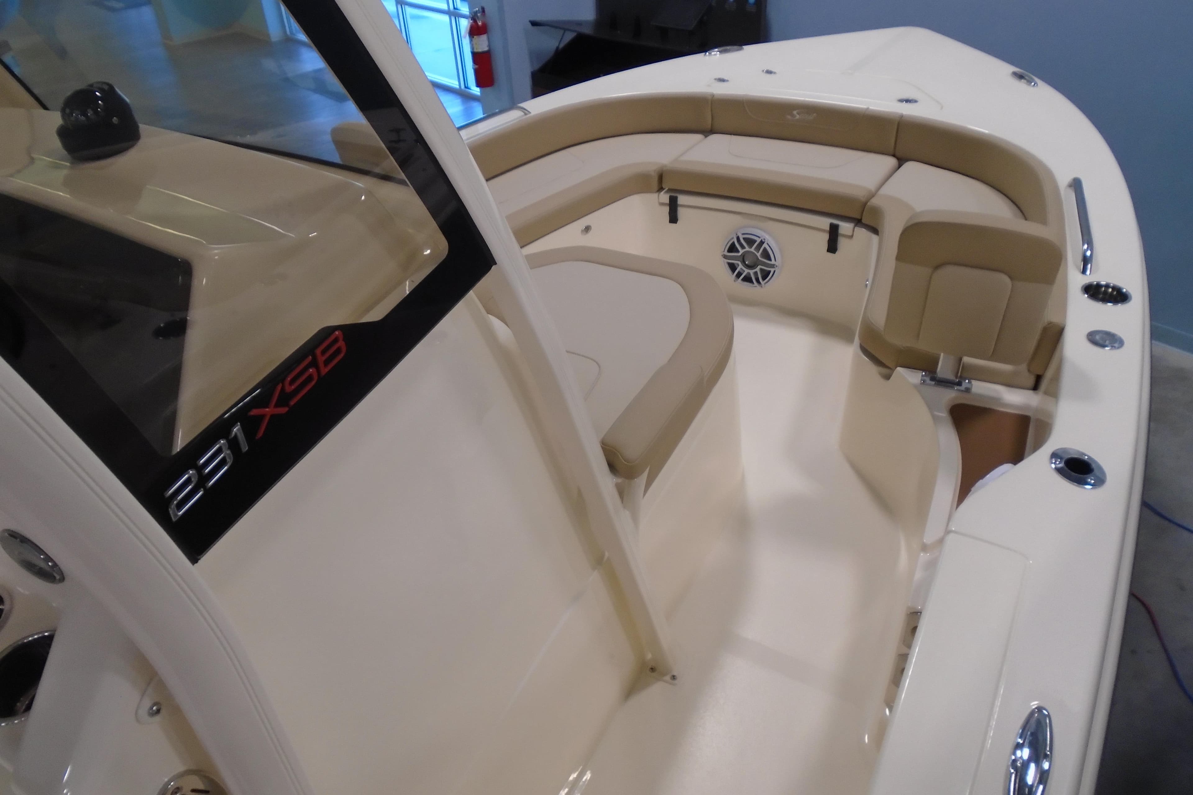 2026 Scout 231 XSB boat interior with beige seating and modern design.