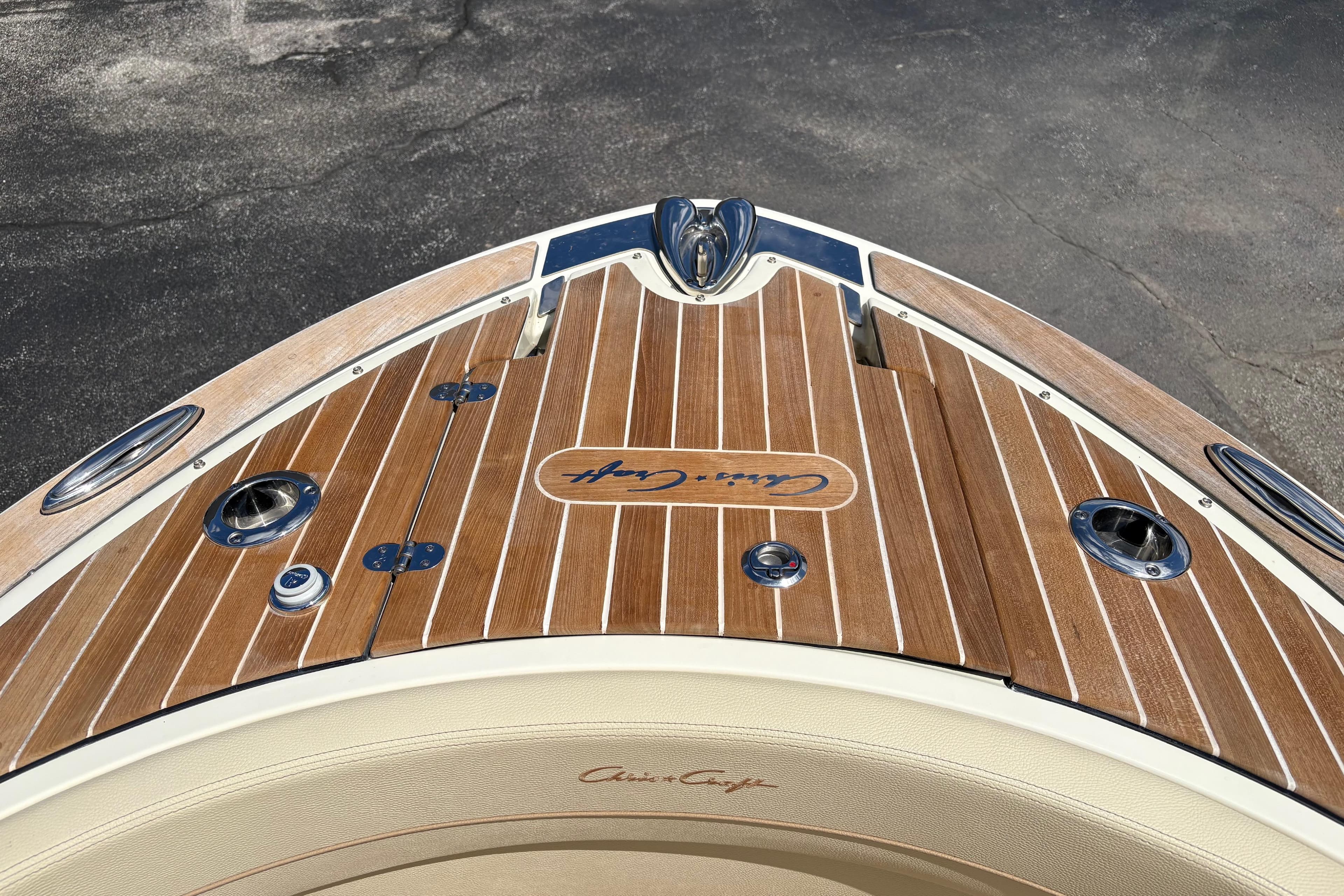 2022 Chris-Craft Launch 28 GT boat with elegant wooden deck design.