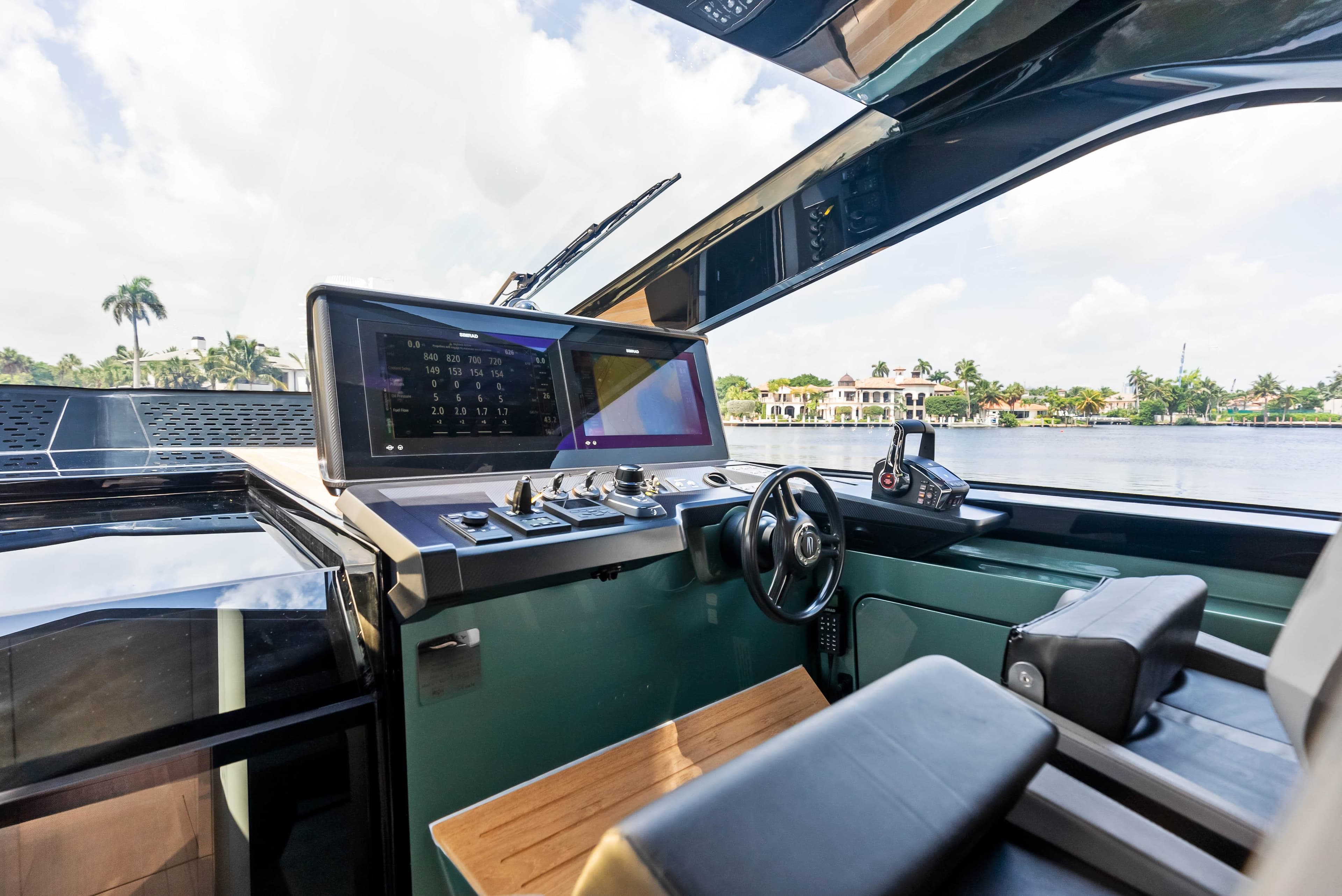Modern helm of 2024 Wally WALLYPOWER 58X yacht with advanced navigation systems.