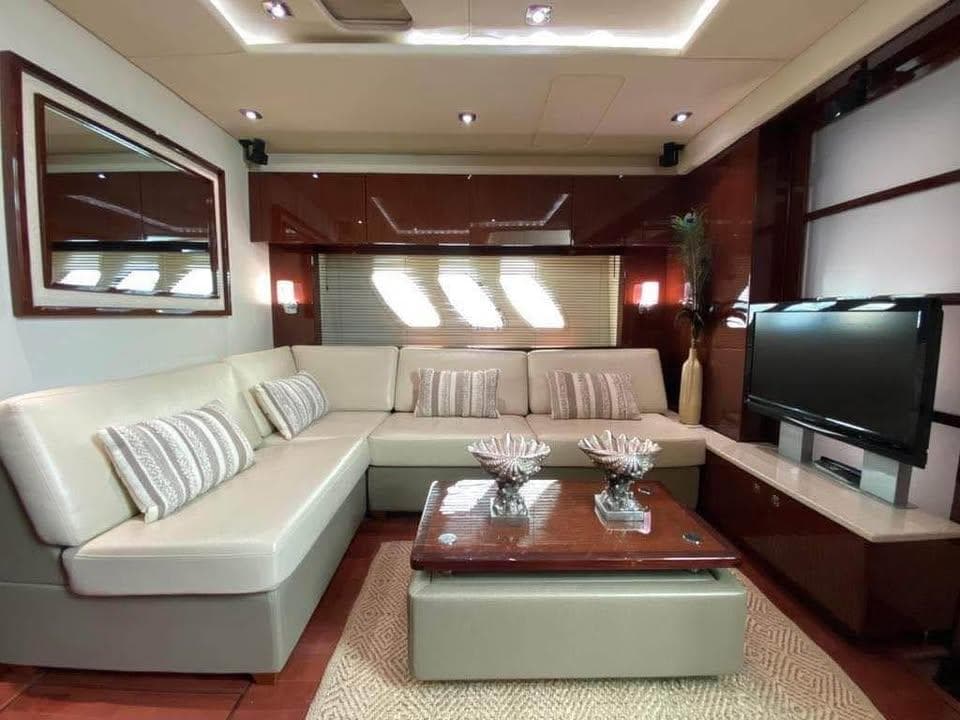 Luxurious interior of 2010 Sea Ray 540 Sundancer yacht with elegant seating and modern decor.