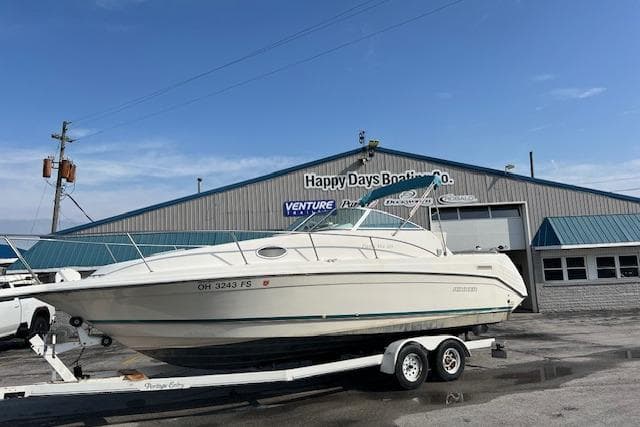 1996 Rinker Fiesta Vee 265 boat on trailer at Happy Days Boating Co.