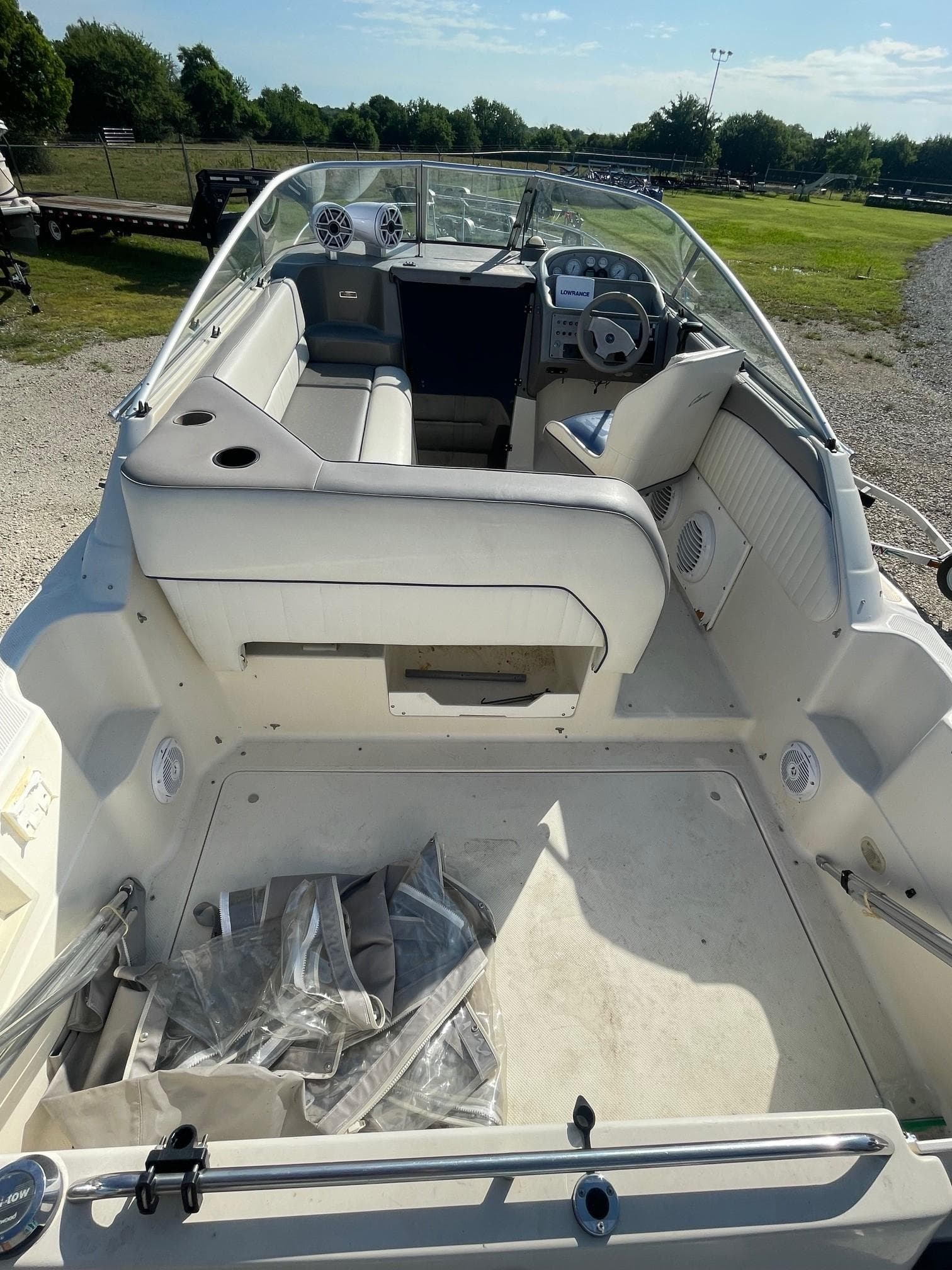 1994 Bayliner 2655 Ciera boat interior with seating and steering wheel.