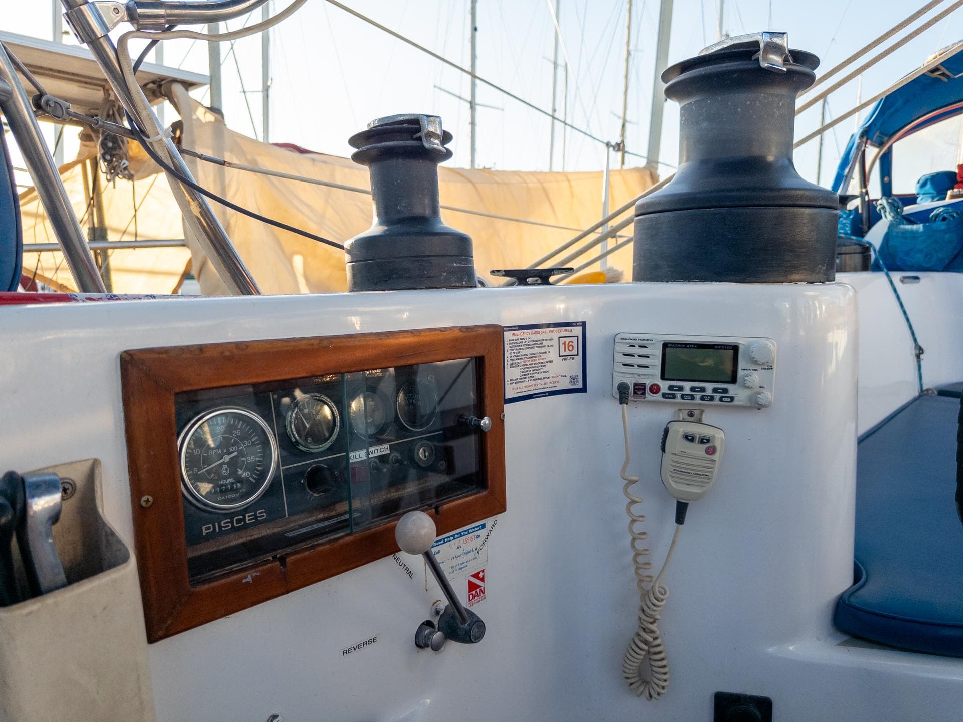 1979 Costa Custom Boats Sloop cockpit with navigation instruments and winches.