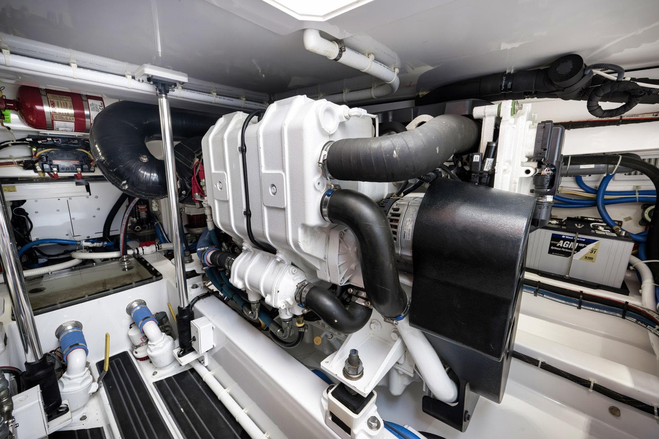 Engine room of 2022 Winter Custom Yachts 38 Walk Around, showcasing advanced marine engineering.