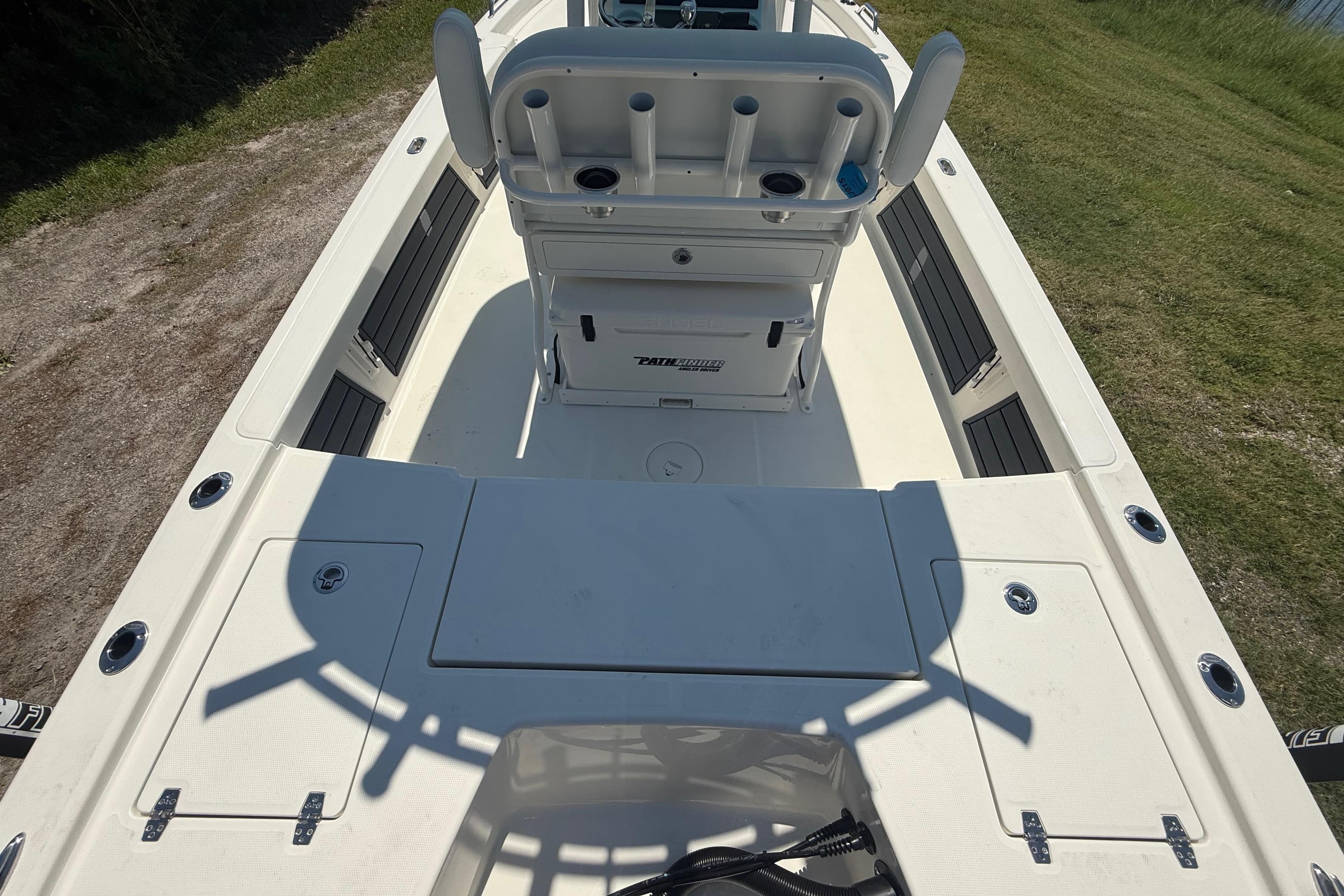 2026 Pathfinder 2200 TRS boat interior with seating and storage compartments.