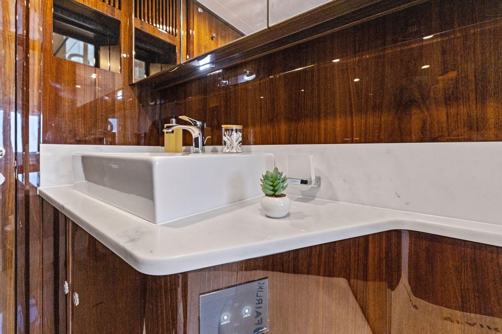 Luxurious bathroom in Fairline Phantom 65 yacht, 2024 model.