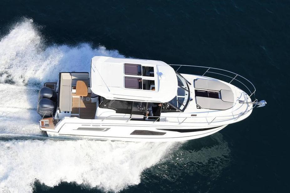 Manufacturer Provided Image: 2020 Jeanneau NC 1095 motor yacht cruising on open water.