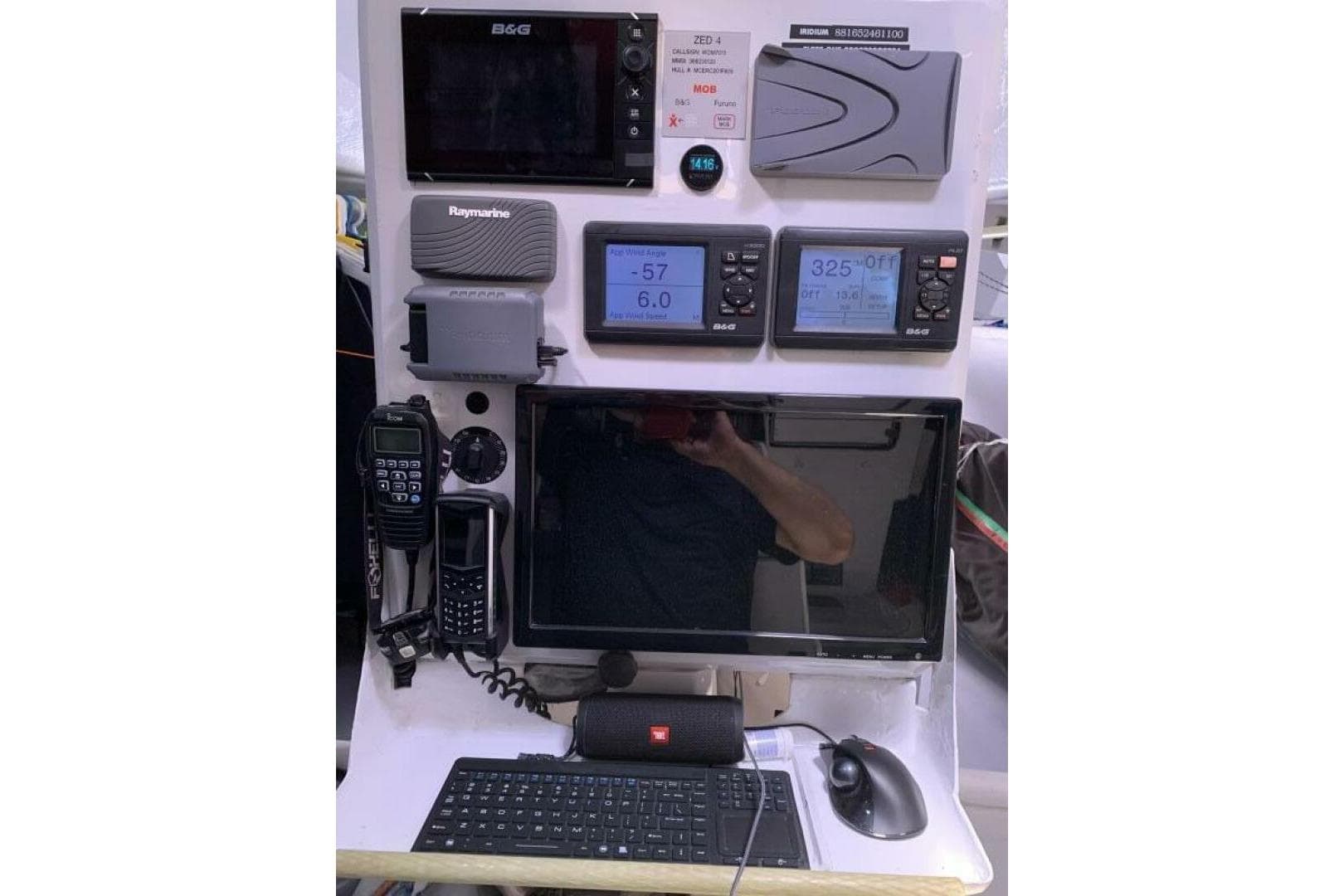 Navigation equipment on 2009 Class 40 Akilaria RC2 sailboat, featuring monitors and communication devices.