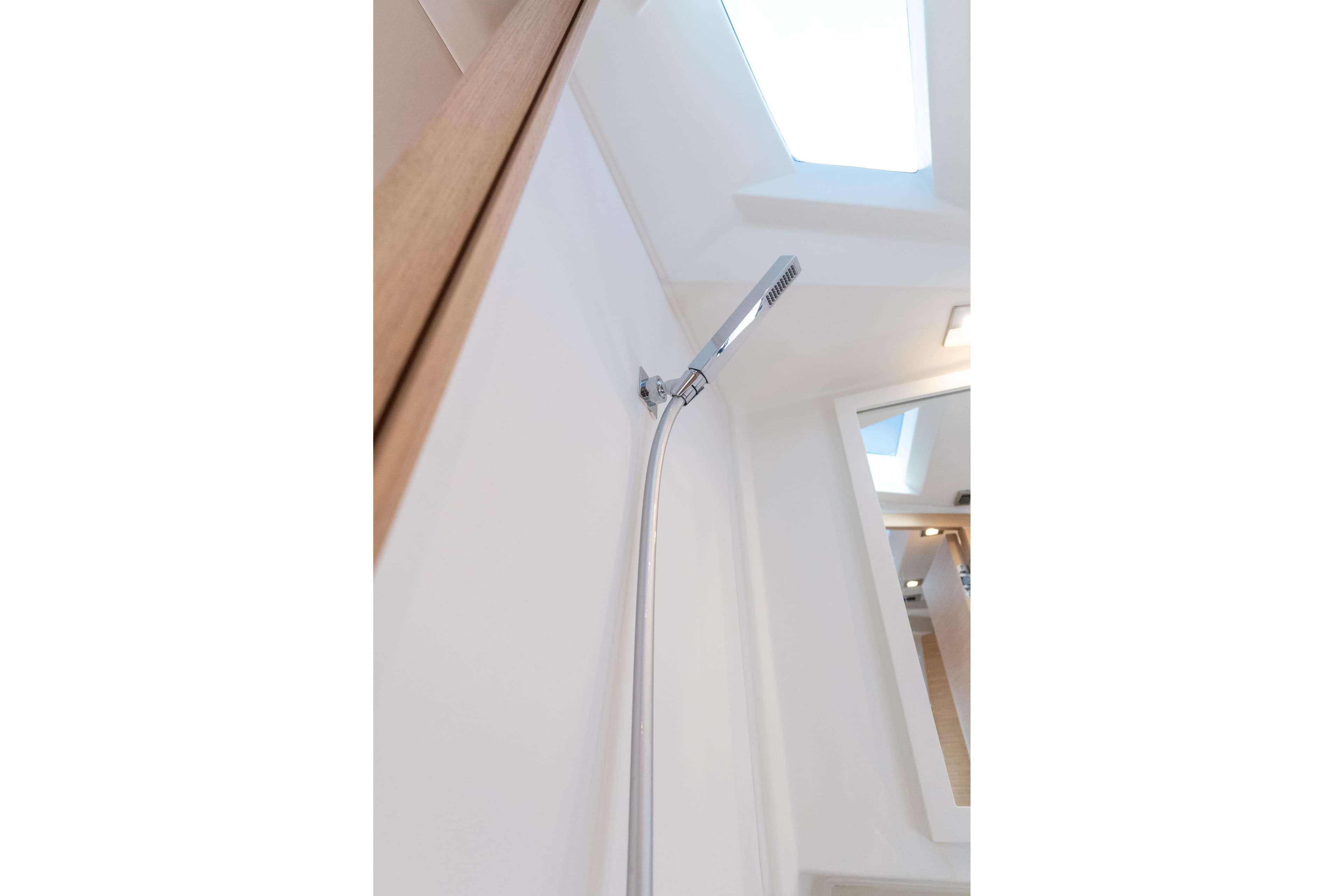 Interior shower of 2025 Pardo Yachts P38R, featuring sleek modern design and skylight.