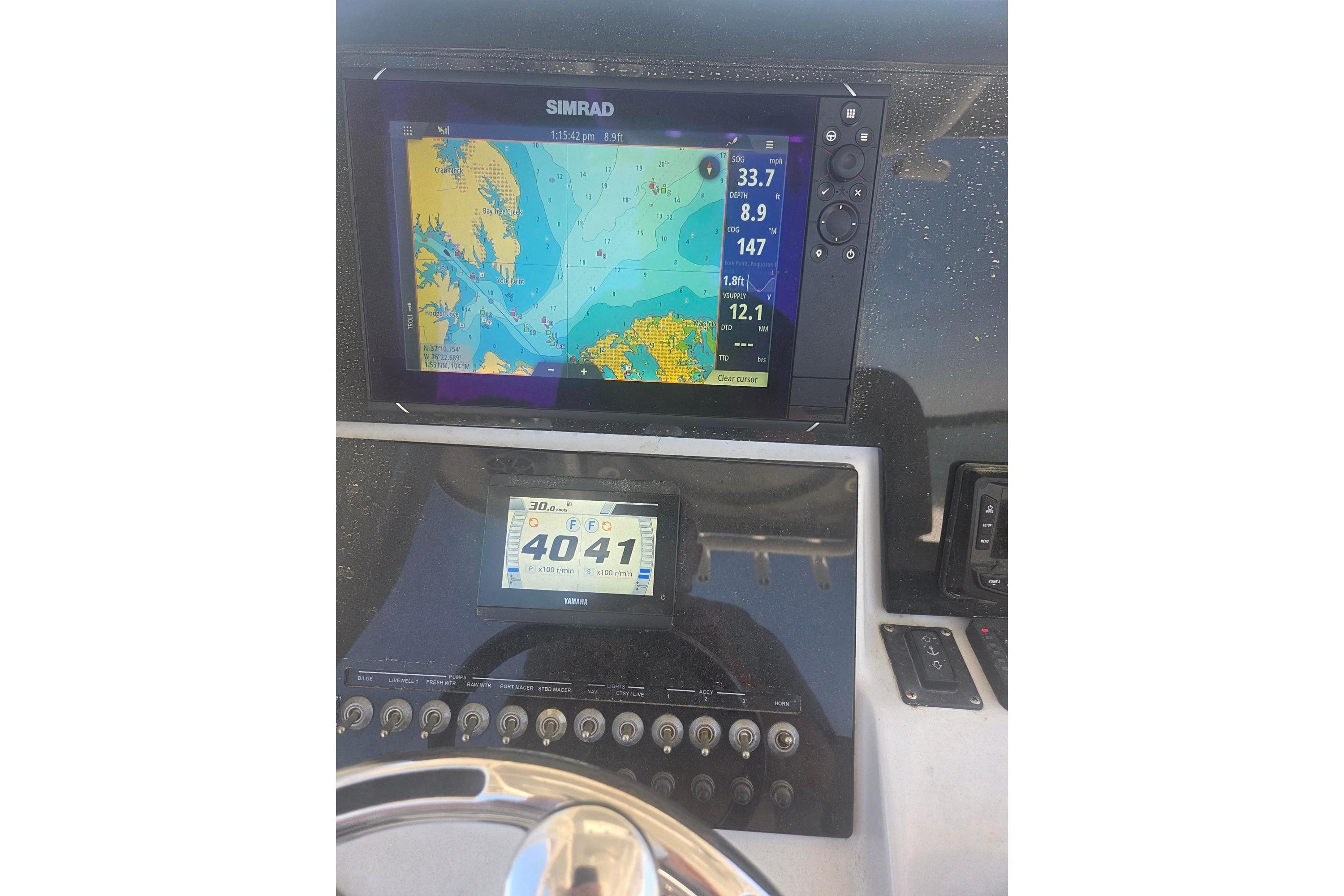 Dashboard of 2021 Sea Pro 259 Center Console with navigation display.