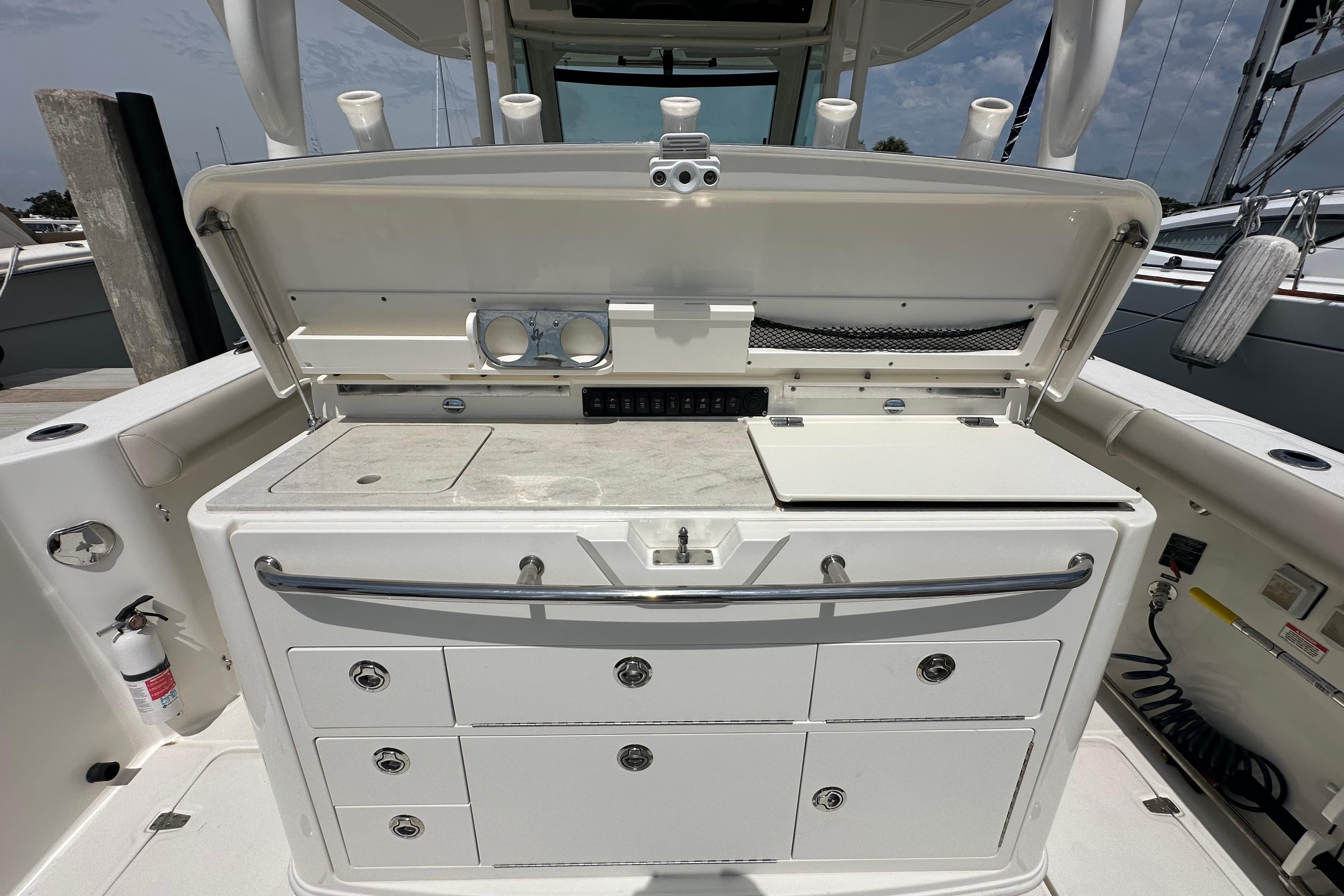 2018 Boston Whaler 350 Outrage boat cockpit with storage and utility area.