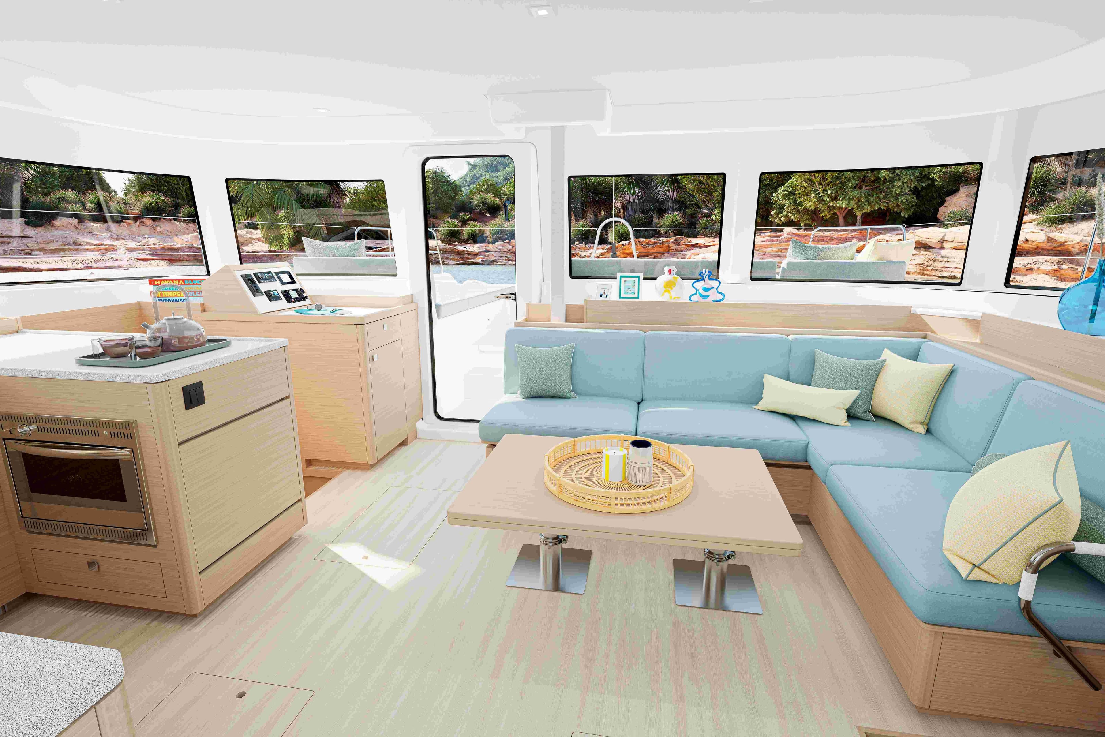 Luxurious interior of 2027 Lagoon 47 yacht with modern kitchen and spacious seating area.