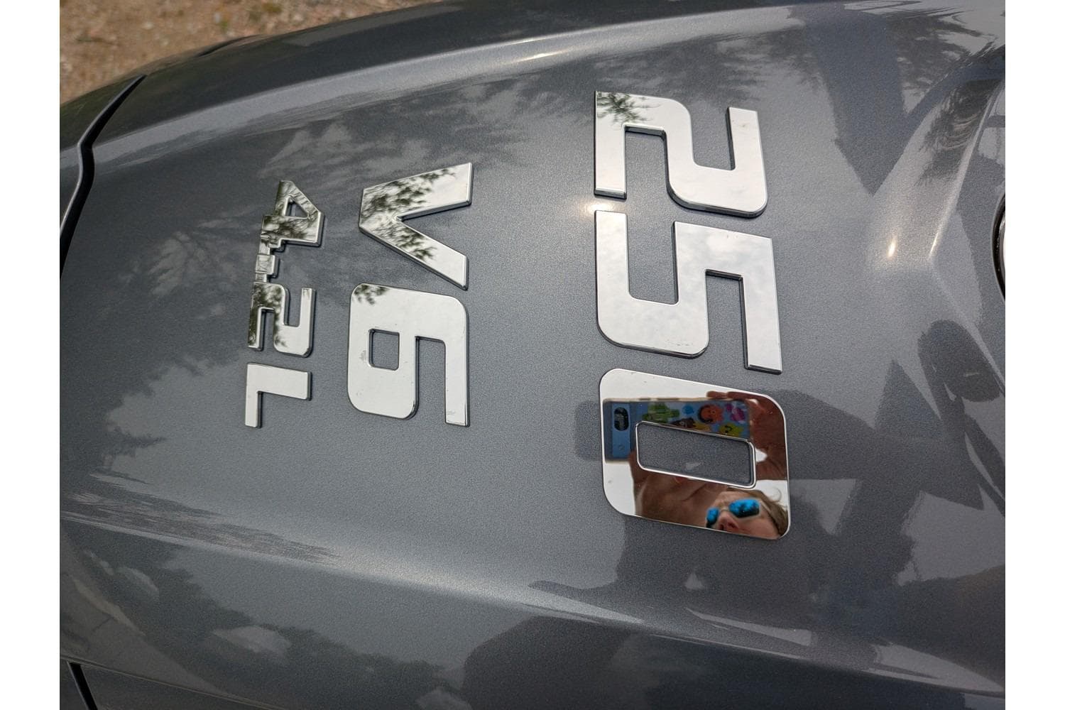 Close-up of Parker 227 Explorer 2026 engine cover with V6 4.2L badge.