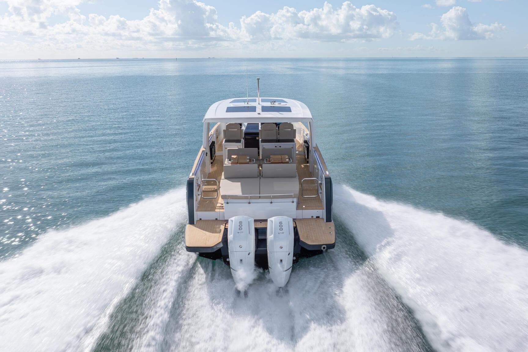 2026 Fjord 41 XP yacht cruising on open water, showcasing powerful dual engines.