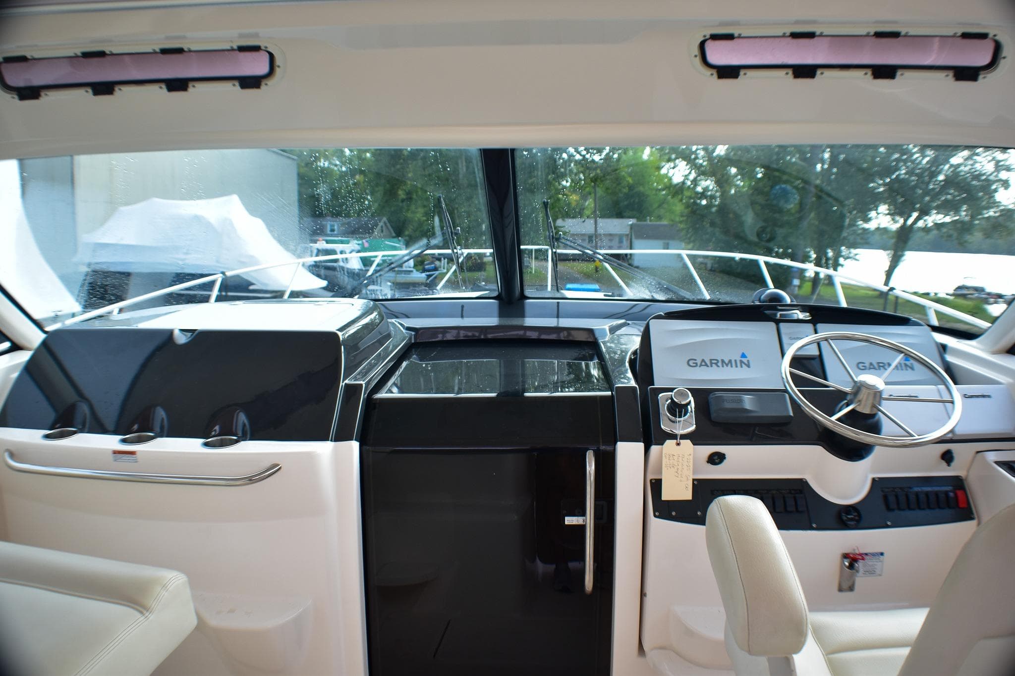 Helm of 2016 Tiara Yachts 4300 Open with Garmin navigation system.