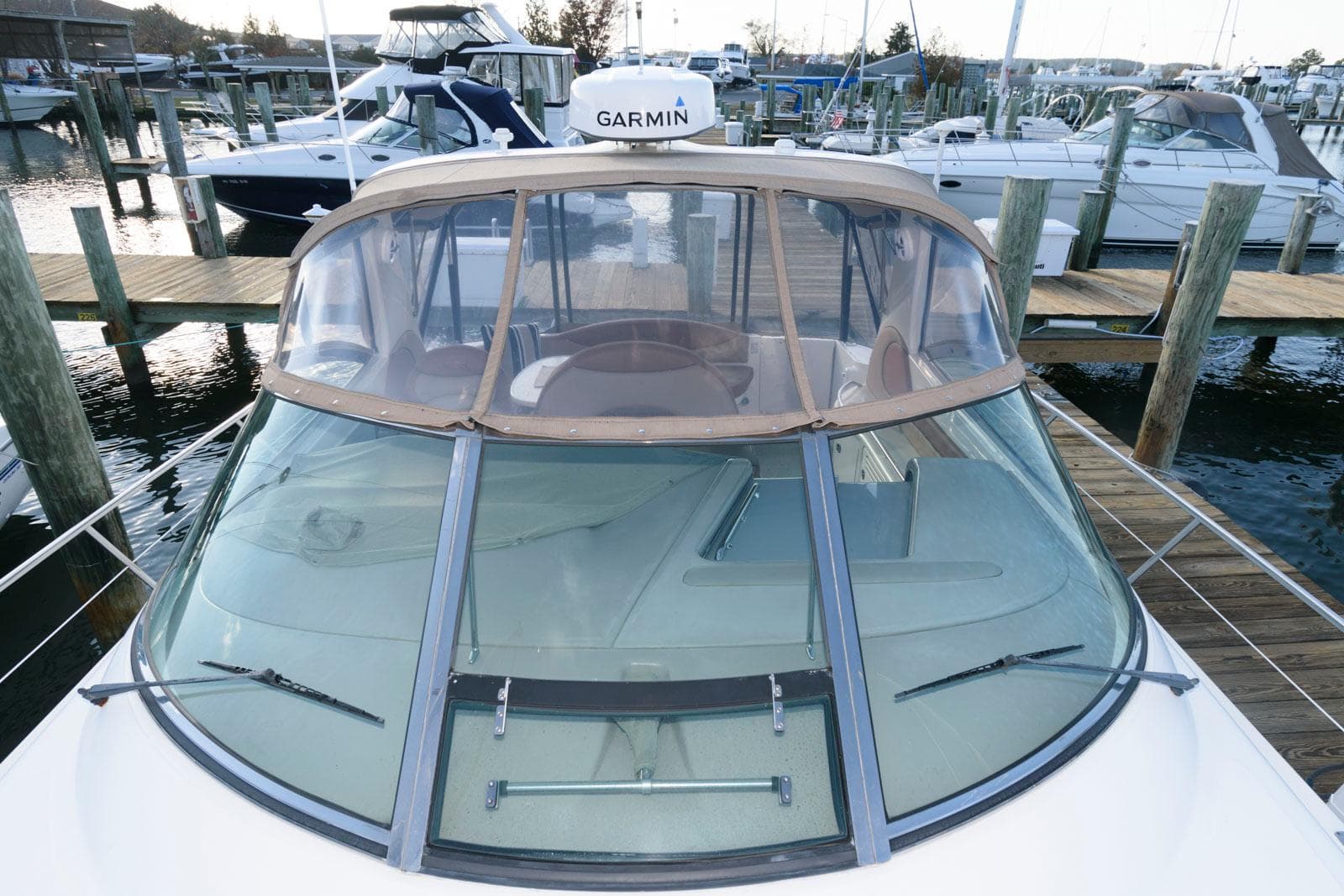 Sea Ray 380 Sundancer 2000 docked at marina with Garmin equipment.