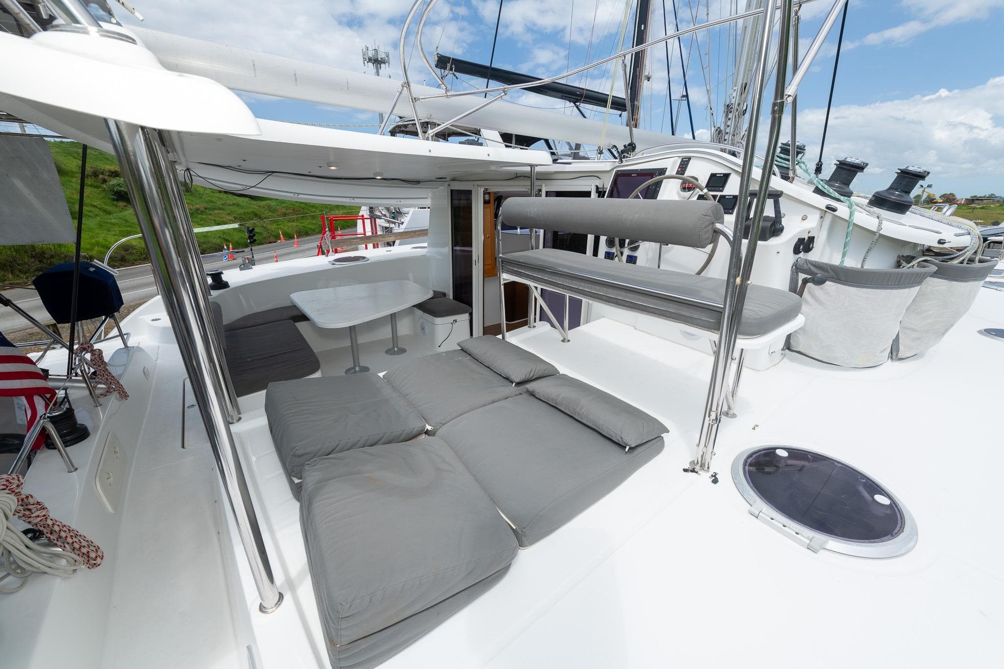 Spacious deck of 2008 Fountaine Pajot Orana 44 catamaran with seating and lounging area.