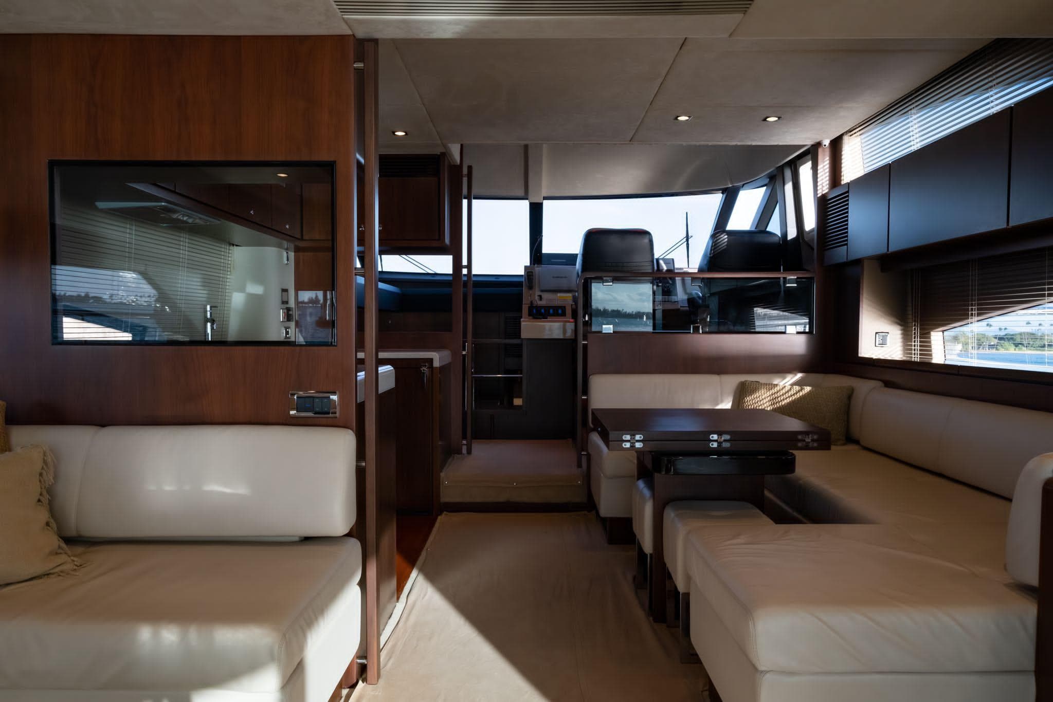 Luxurious interior of 2013 Fairline Squadron 65 yacht with elegant seating and modern design.