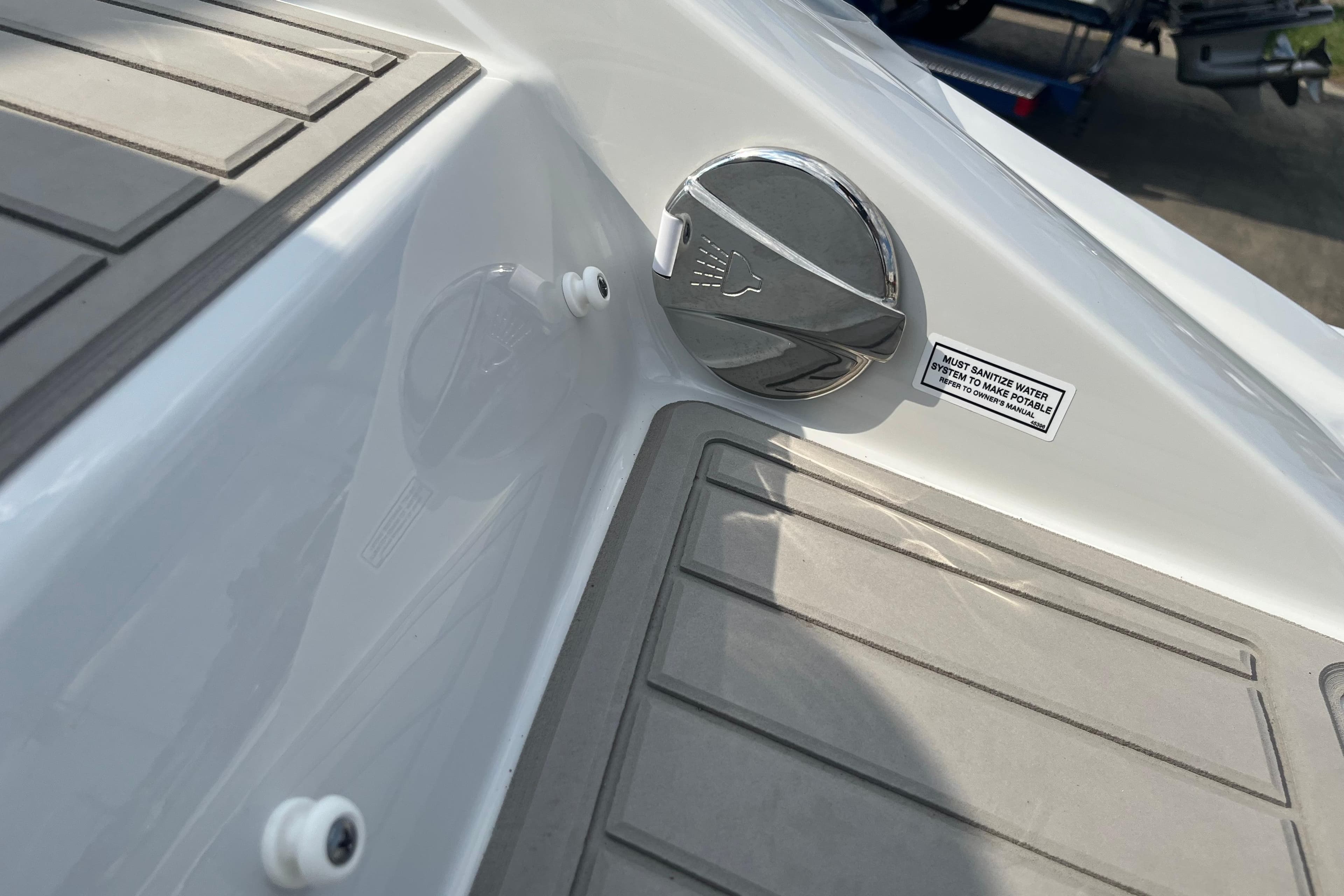 2025 Crownline Eclipse E235 boat deck with water system control.