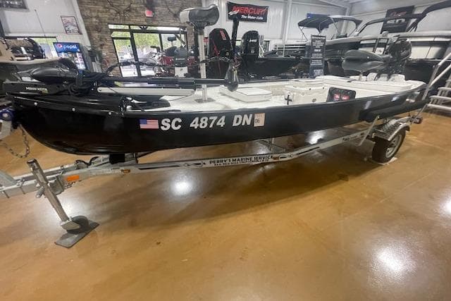 2020 Santee 160TS boat on trailer in showroom, black exterior, registration SC 4874 DN.