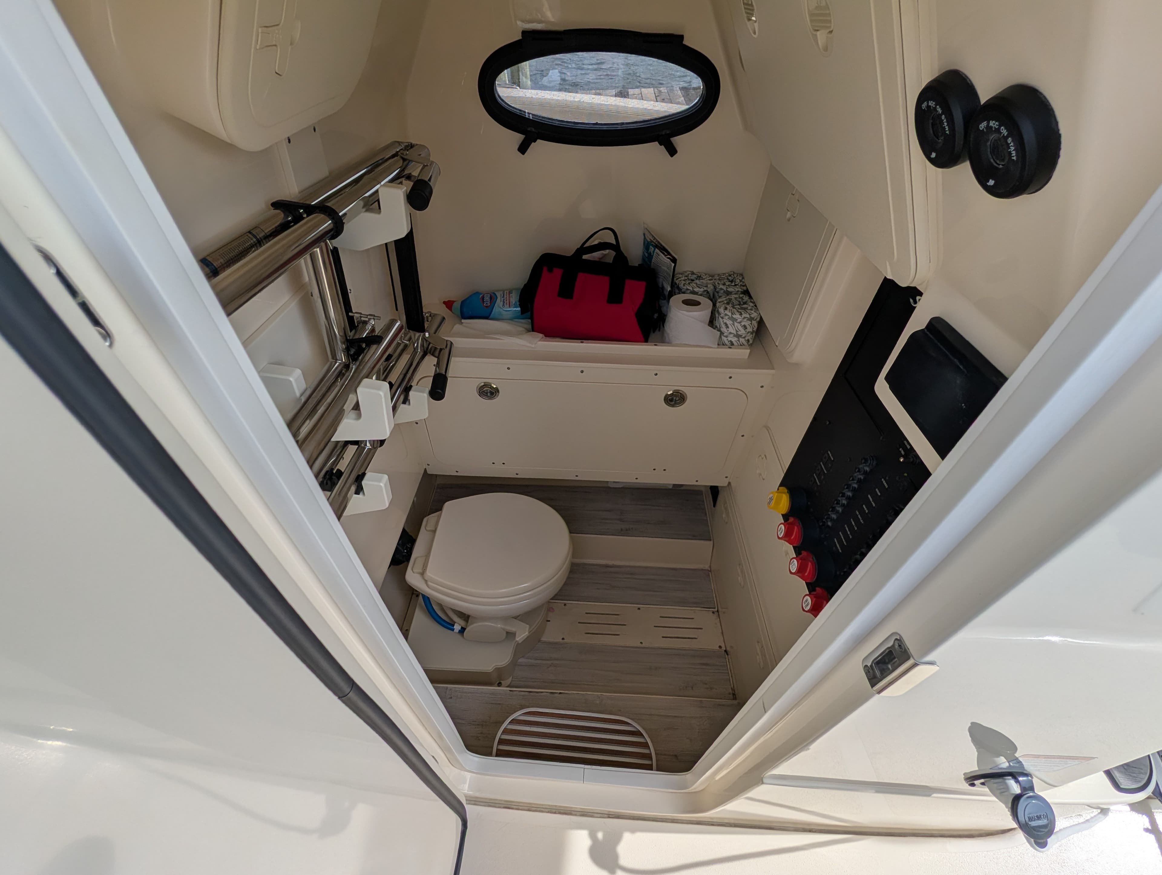 Interior of 2024 Scout 277 LXF featuring toilet and storage area.