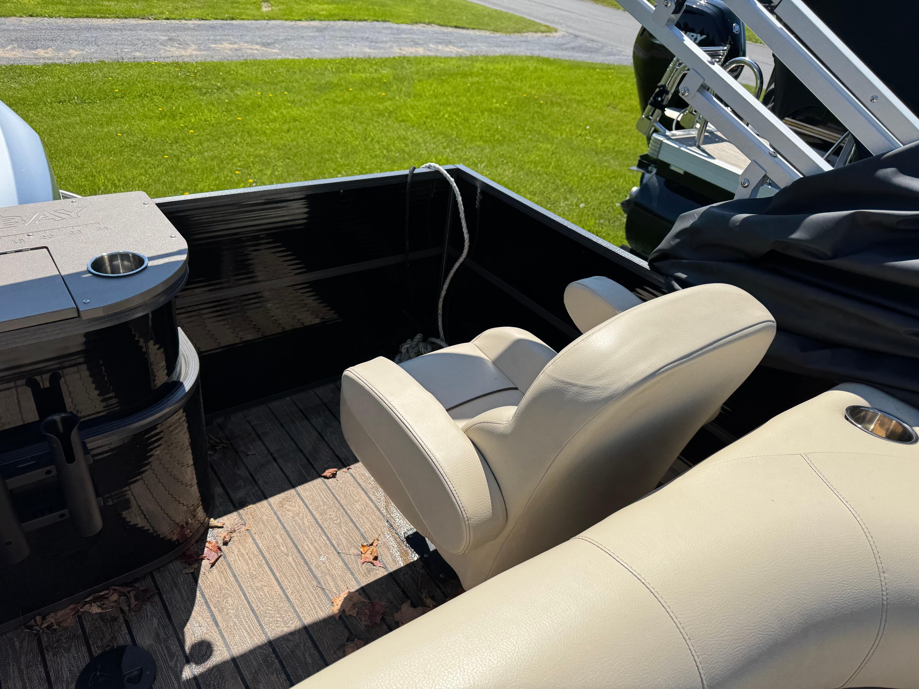 2022 Montego Bay 8522 2PT BK DLX Fish & Cruise boat interior with beige seating.