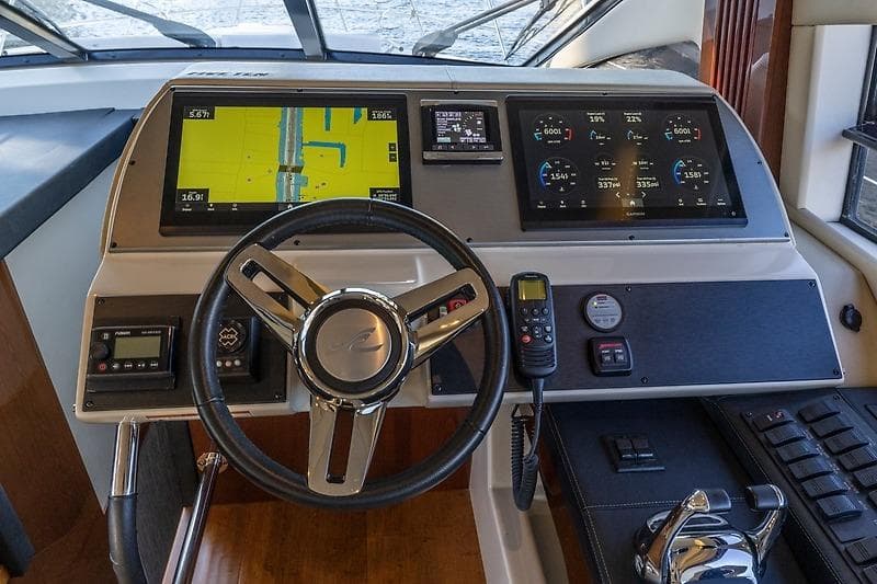 2016 Sea Ray 510 Flybridge helm with advanced navigation and control systems.