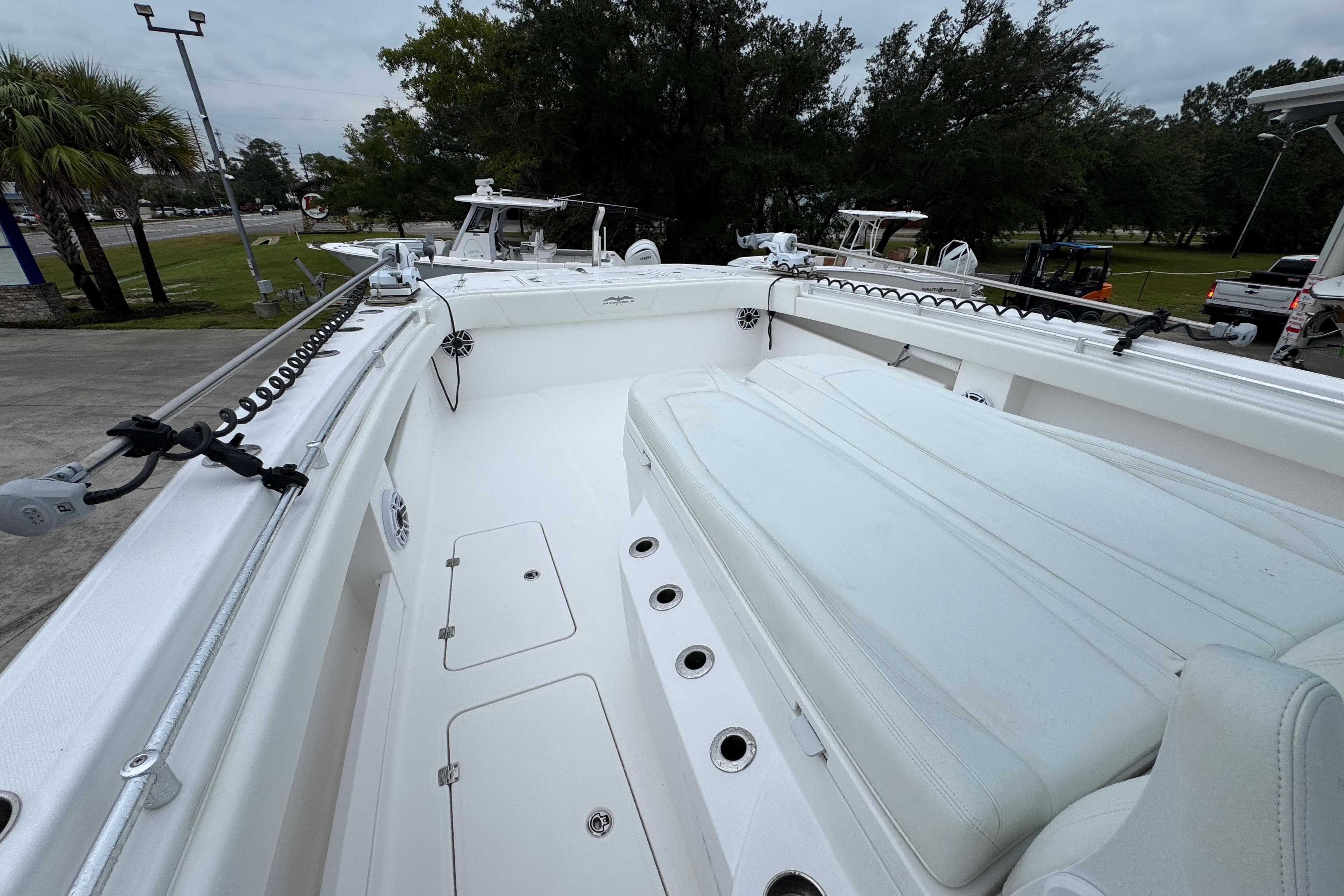 2025 Invincible 40 Catamaran deck with seating, showcasing spacious and sleek design.