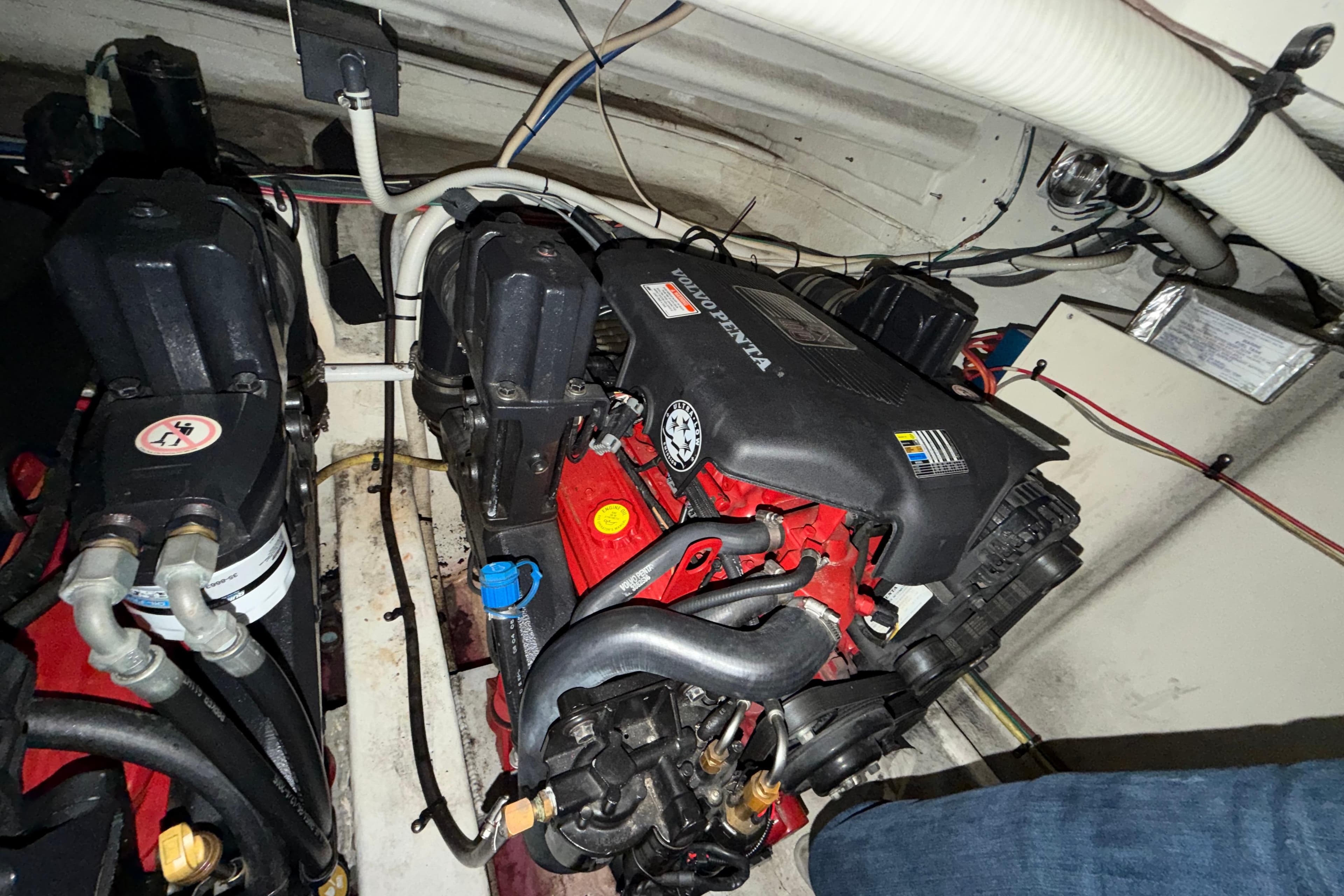 Engine compartment of a 2006 Cruisers Yachts 300 Express, featuring a Volvo Penta engine.