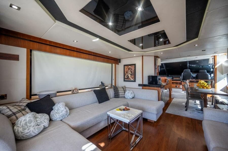 Luxurious interior of a 2015 Sunseeker 75 yacht with modern furnishings and elegant decor.