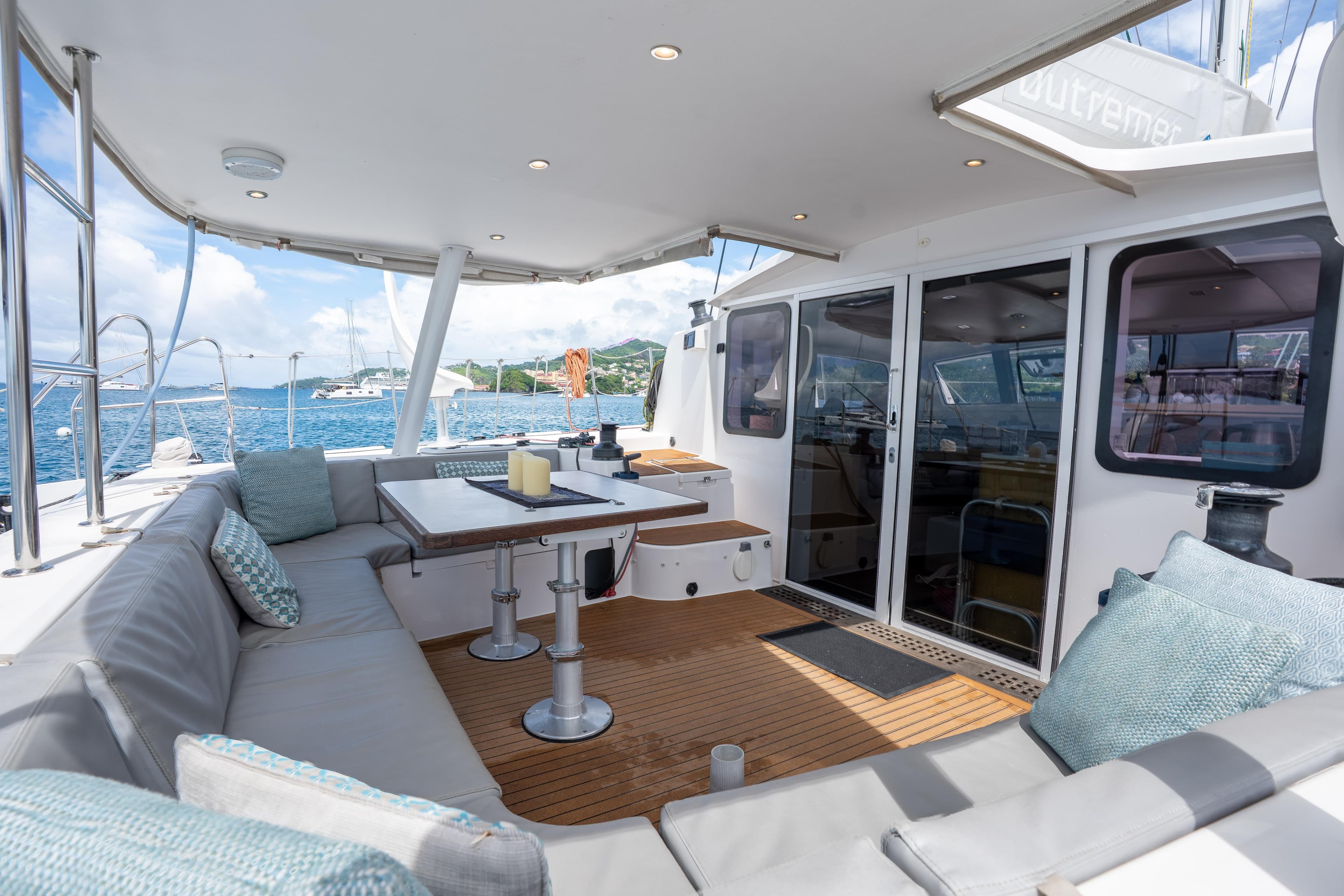Luxurious 2020 Outremer 51 catamaran with spacious deck and comfortable seating.
