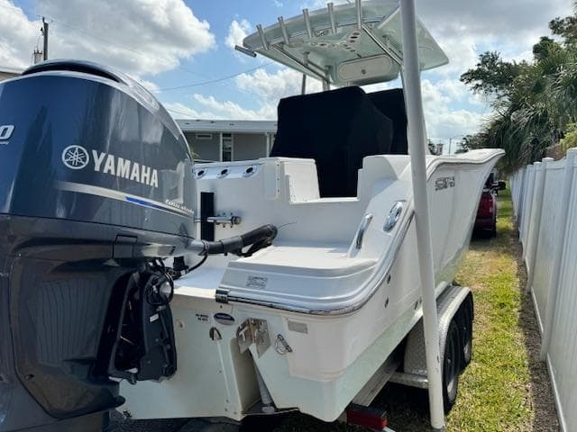 2013 Sea Fox 286 CC boat with Yamaha outboard motor on trailer.