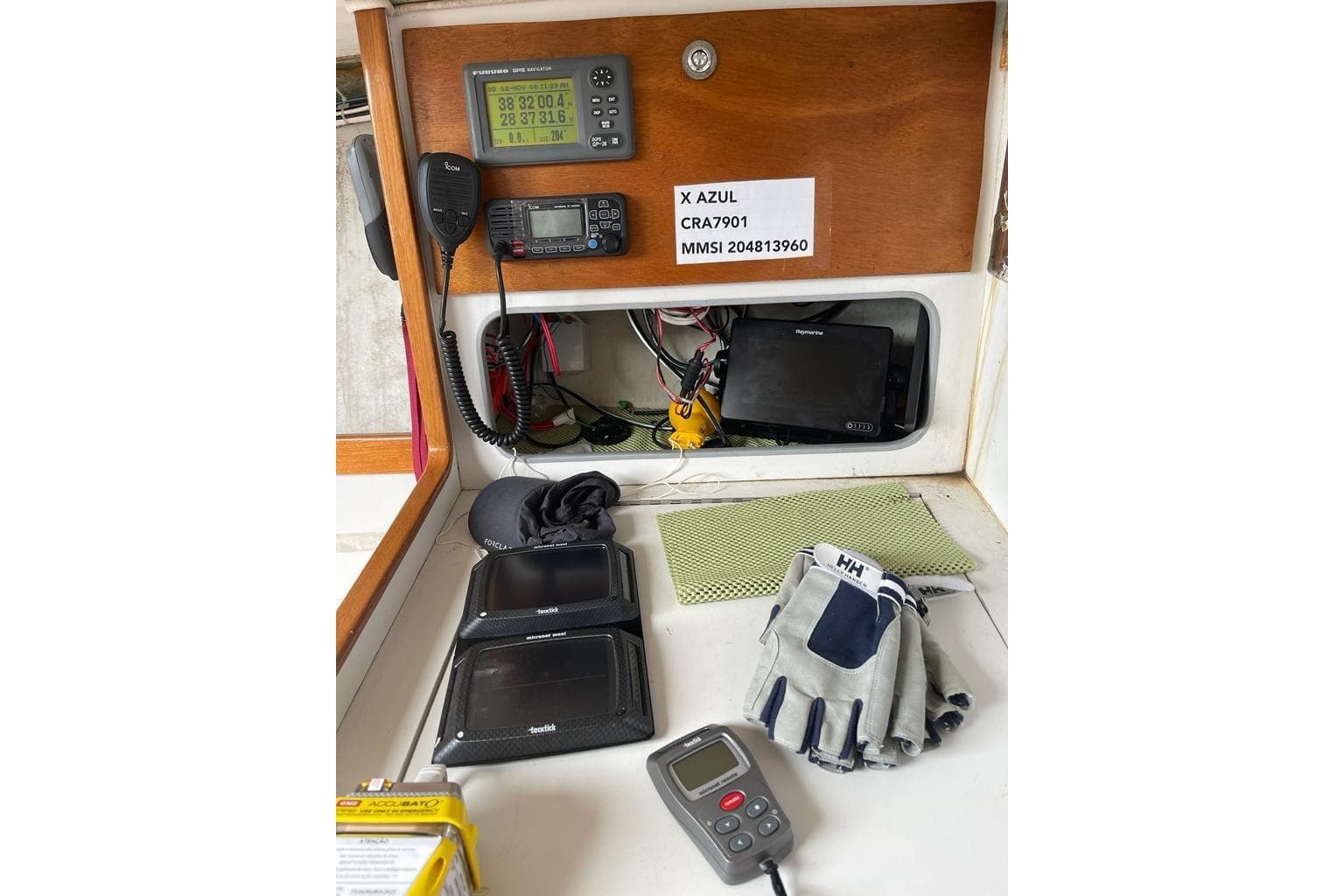 Interior of a 2001 J Boats J/105 sailboat with navigation equipment and sailing gear.