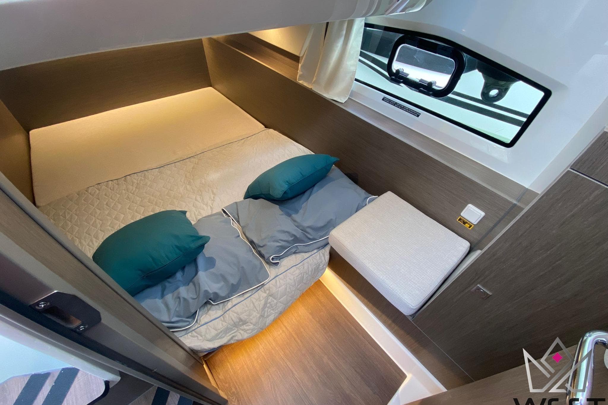 Cozy cabin interior of 2026 Jeanneau Merry Fisher 1095 Fly Serie 2 yacht.