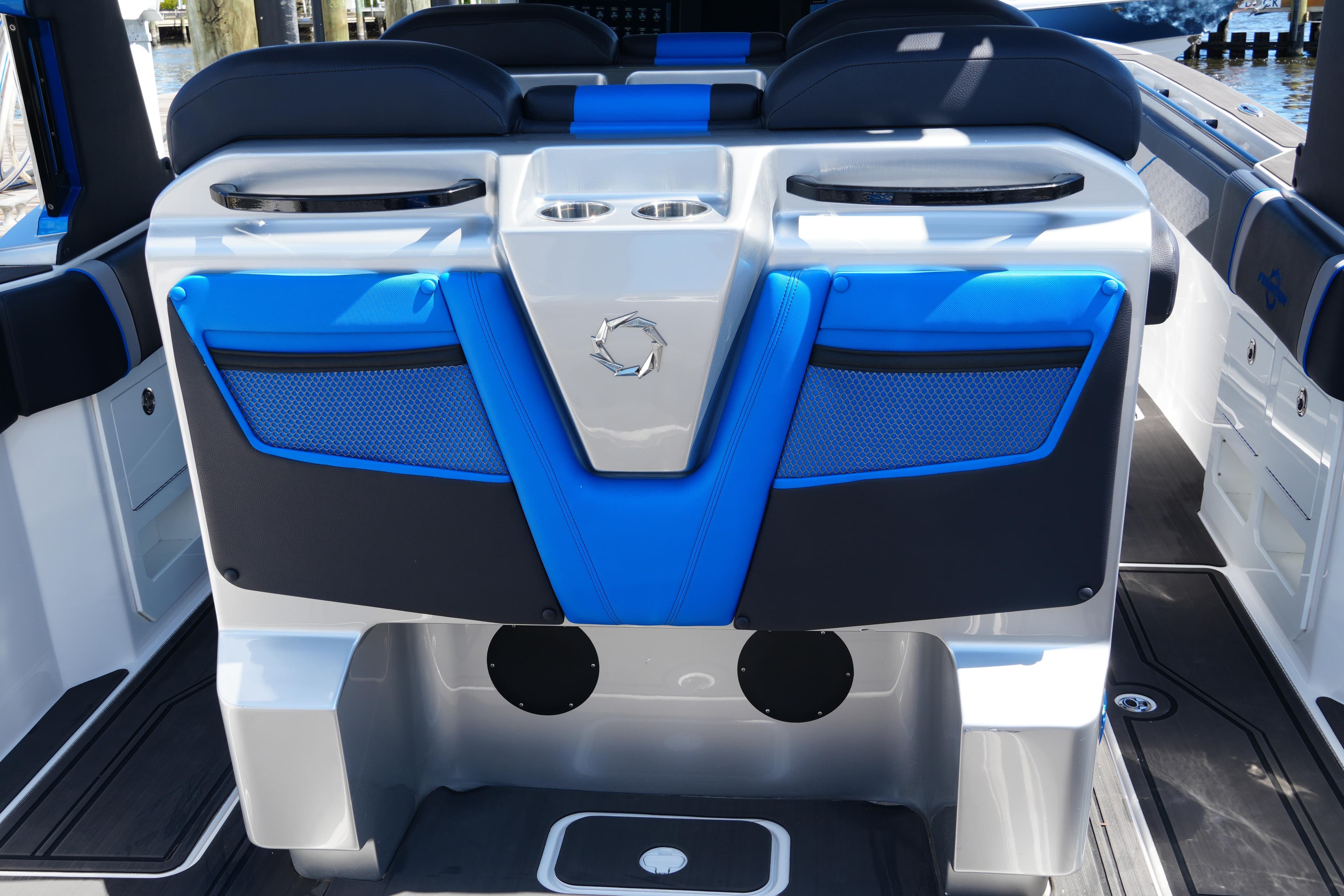 2024 Fountain 38 SCX boat interior with blue and black seating and modern design.