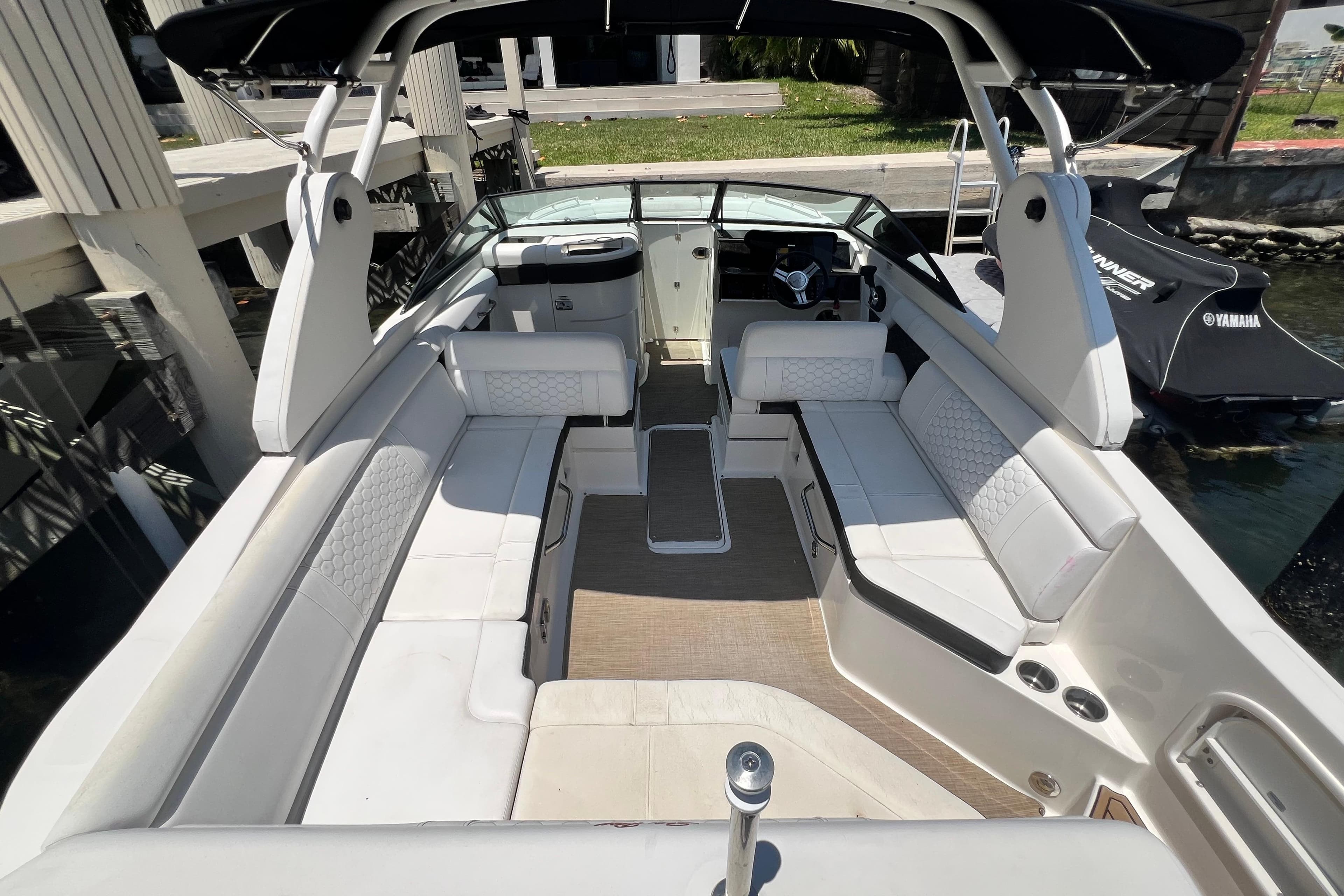 2019 Sea Ray SDX 270 Outboard boat interior with spacious seating and modern design.