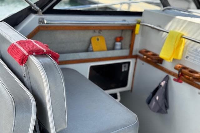 1988 Penn Yan Predator 288 boat interior with seating and storage compartments.