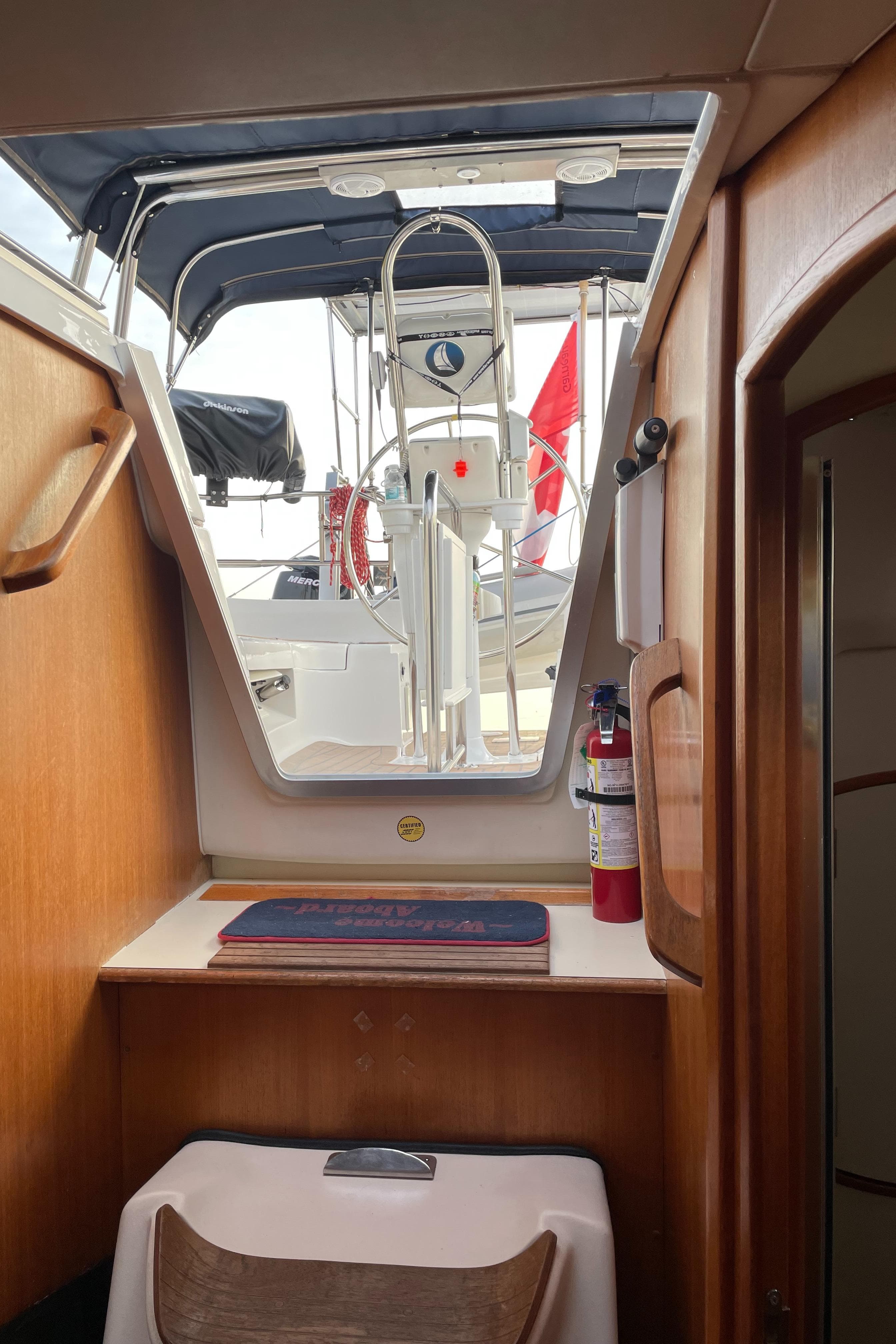 Interior view of 2003 Hunter 356 sailboat with cockpit access and safety equipment.