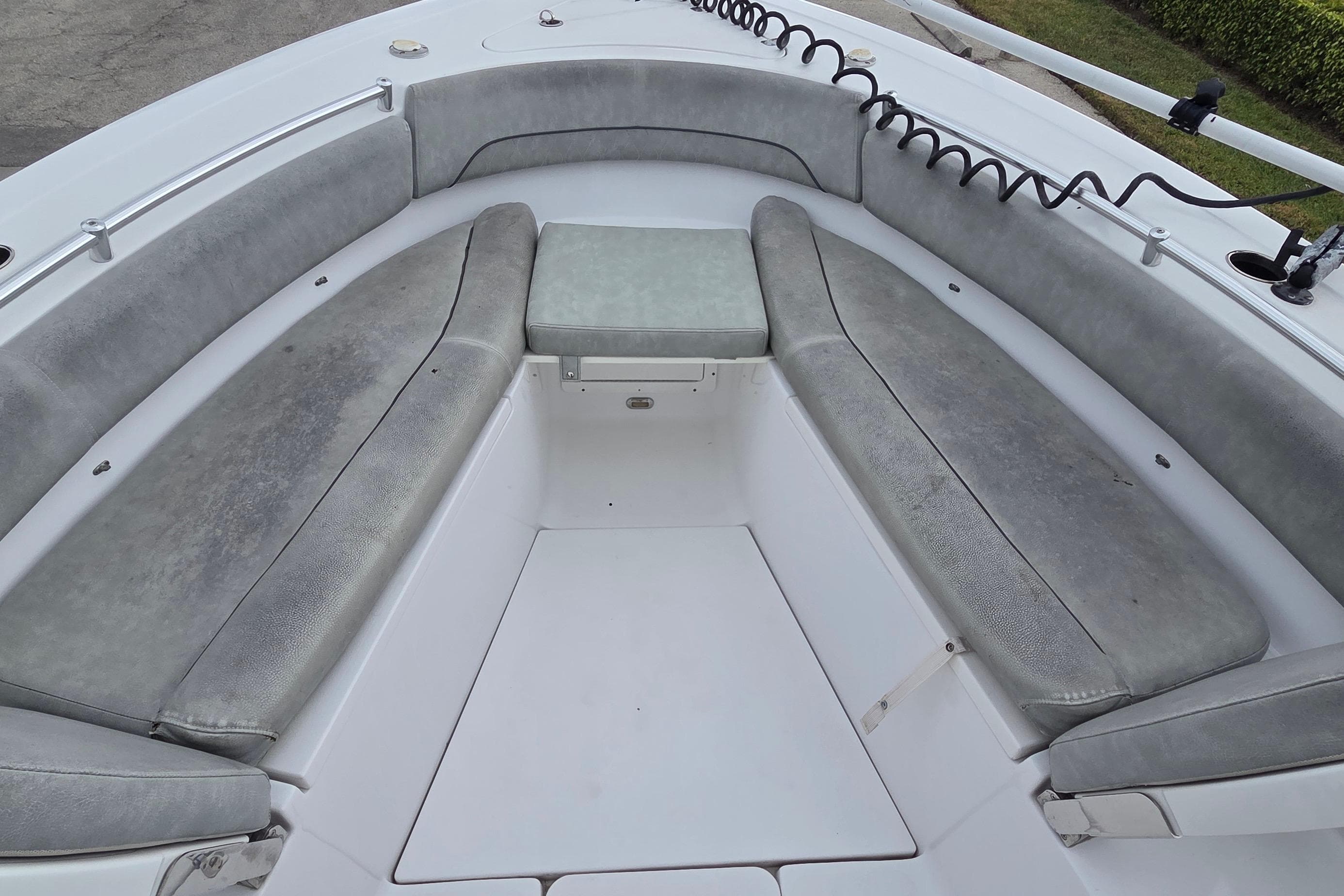 2020 Sportsman Open 282 Center Console boat interior with cushioned seating.