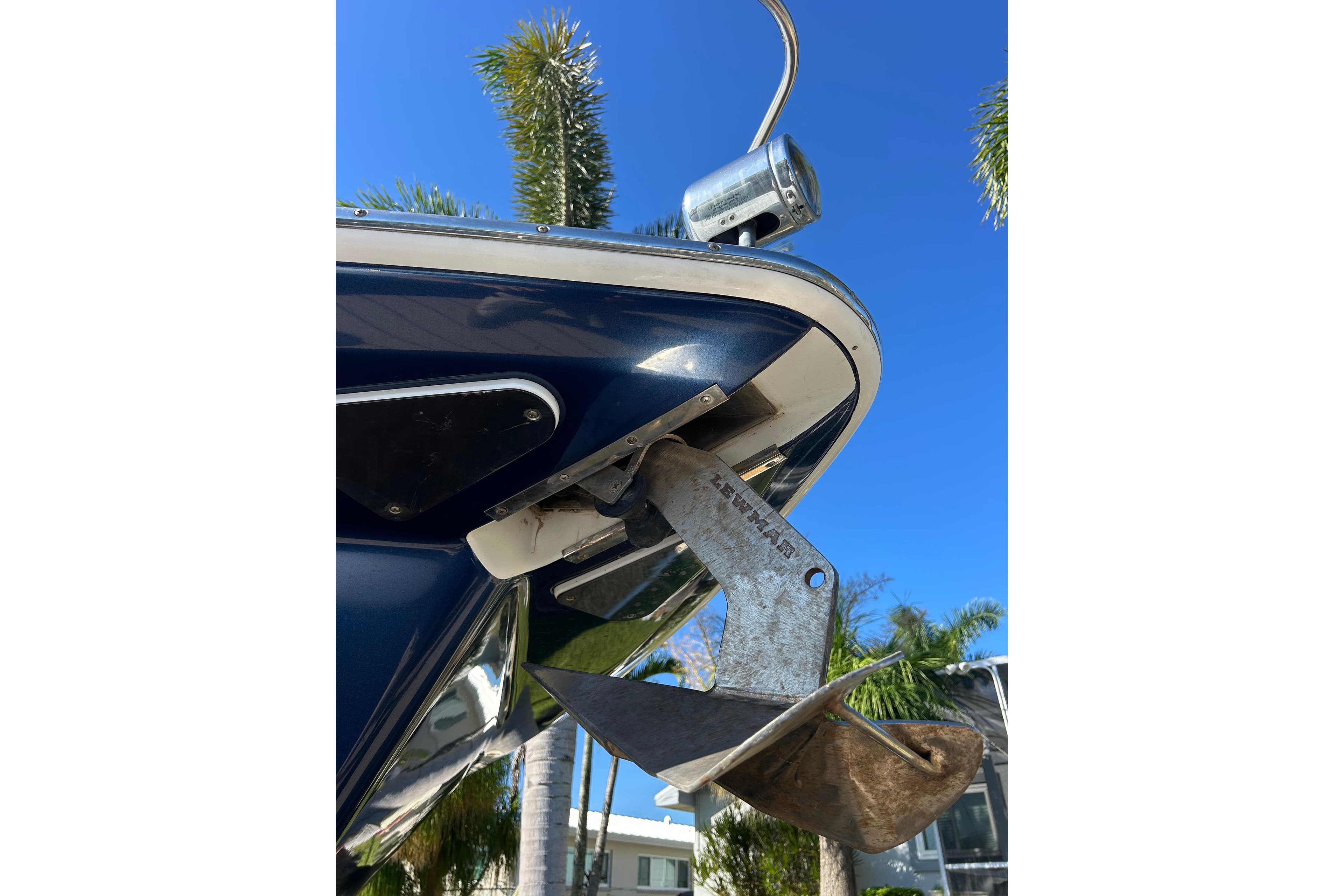 2008 Formula 34 Performance Cruiser anchor detail against blue sky backdrop.