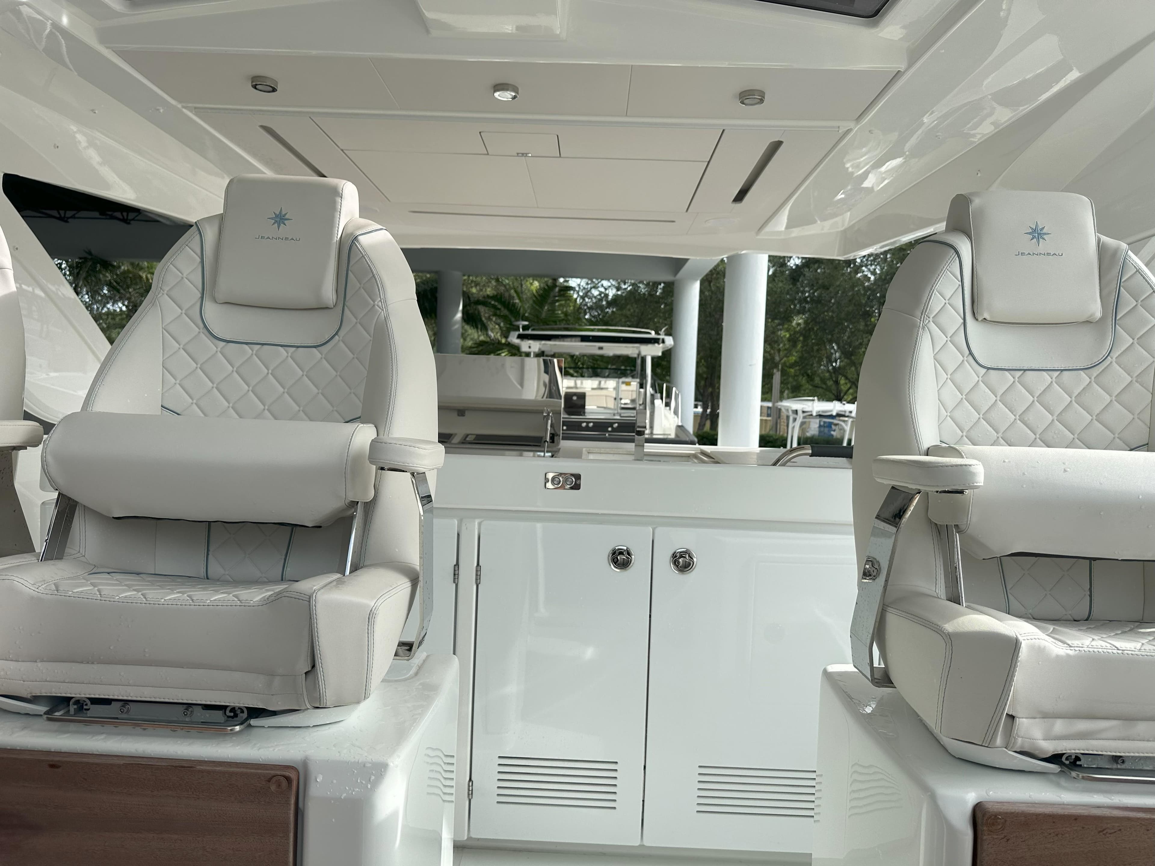 Luxury interior of 2024 Jeanneau DB 43 yacht with plush seating and modern design.