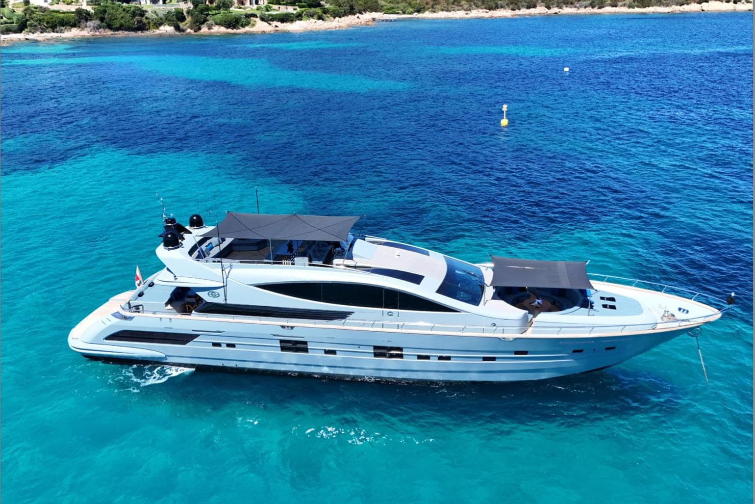 Luxurious 2009 Cerri Cantieri Navali 102 yacht cruising in clear blue waters.